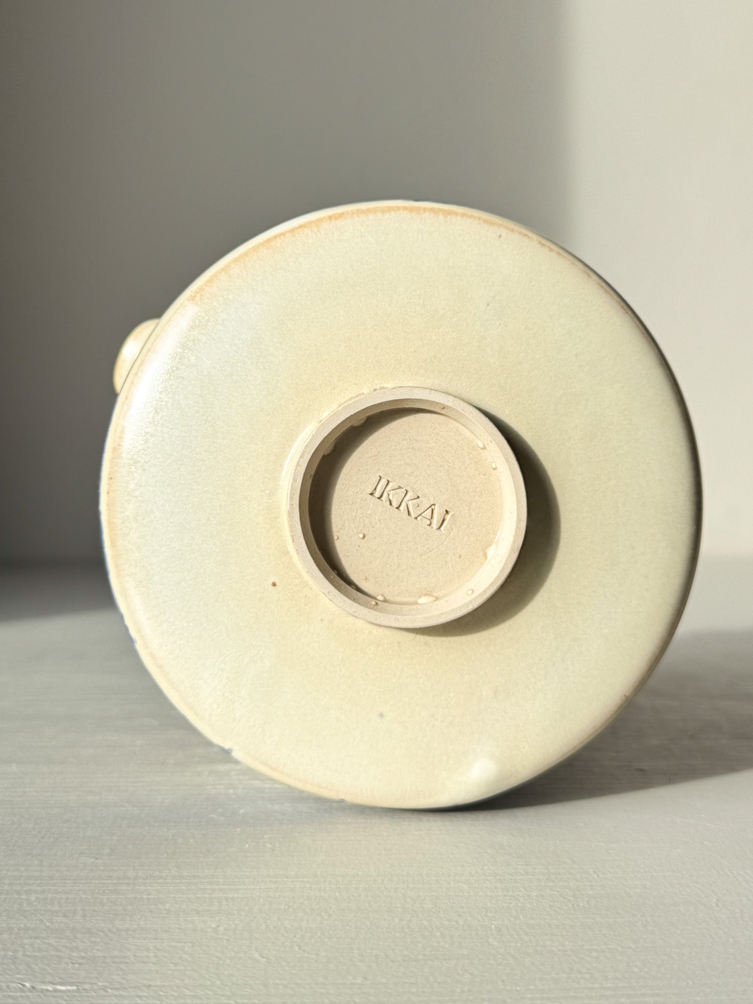 Base of Matcha bowl Spout - Moonstone & Blue #02, showcasing delicate craftsmanship and smooth moonstone glaze finish.