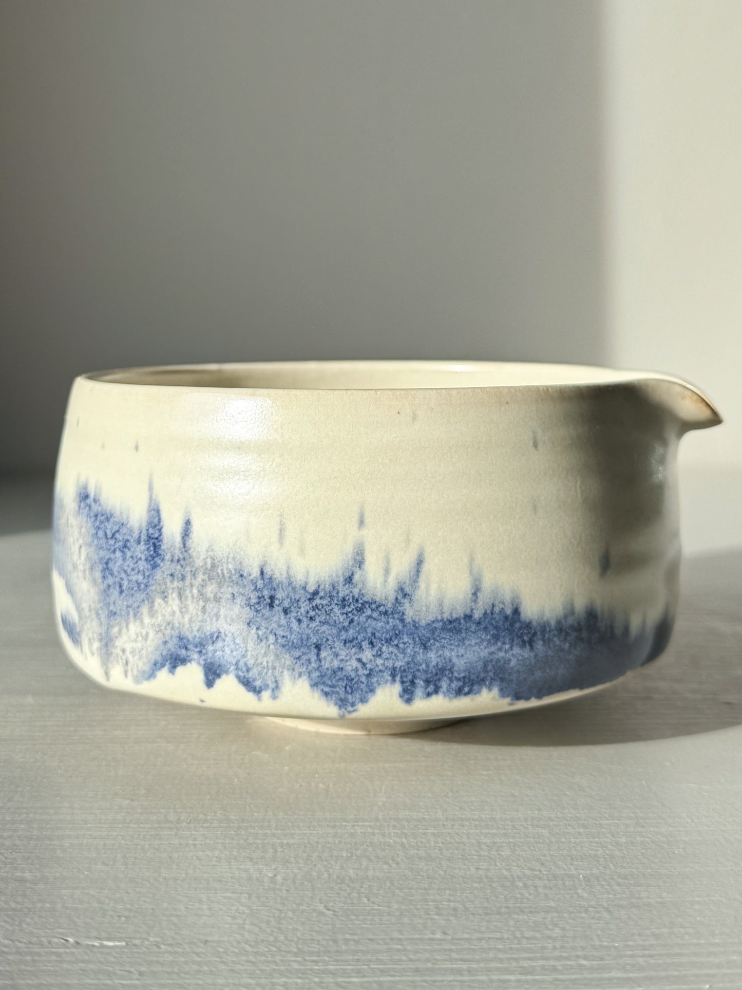 Matcha bowl Spout - Moonstone & Blue #02 with hand-splashed cobalt glaze and a soft moonstone layer, offering a tranquil tea experience.