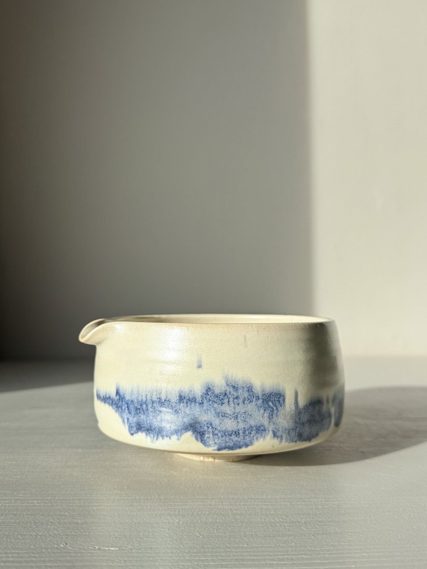 Matcha bowl Spout - Moonstone & Blue #02 with hand-splashed cobalt glazes and silky moonstone finish, perfect for daily tea rituals.