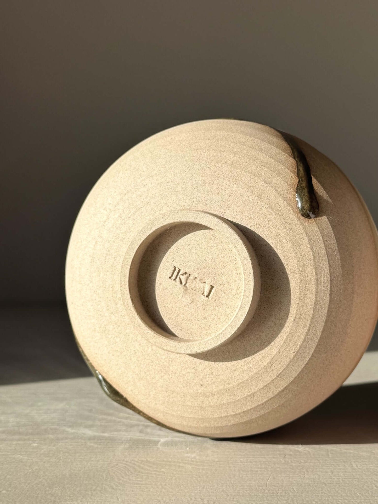 Matcha Bowl with Spout – Inyo #04 bottom view of handmade ceramic with unique glaze details