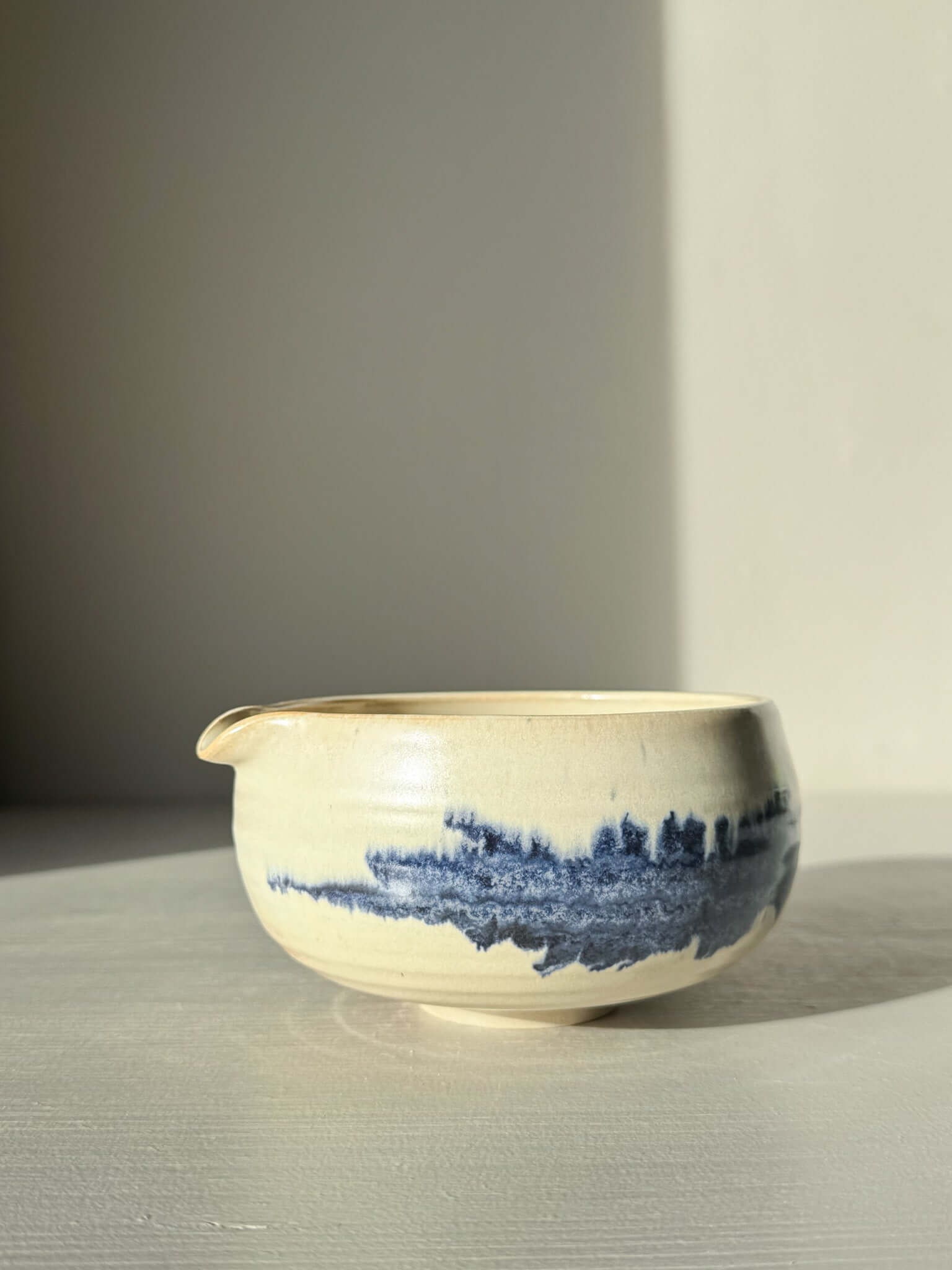 Matcha Bowl with Spout - Moonstone & Blue featuring a cobalt blue and moonstone glaze with spout for easy pouring.
