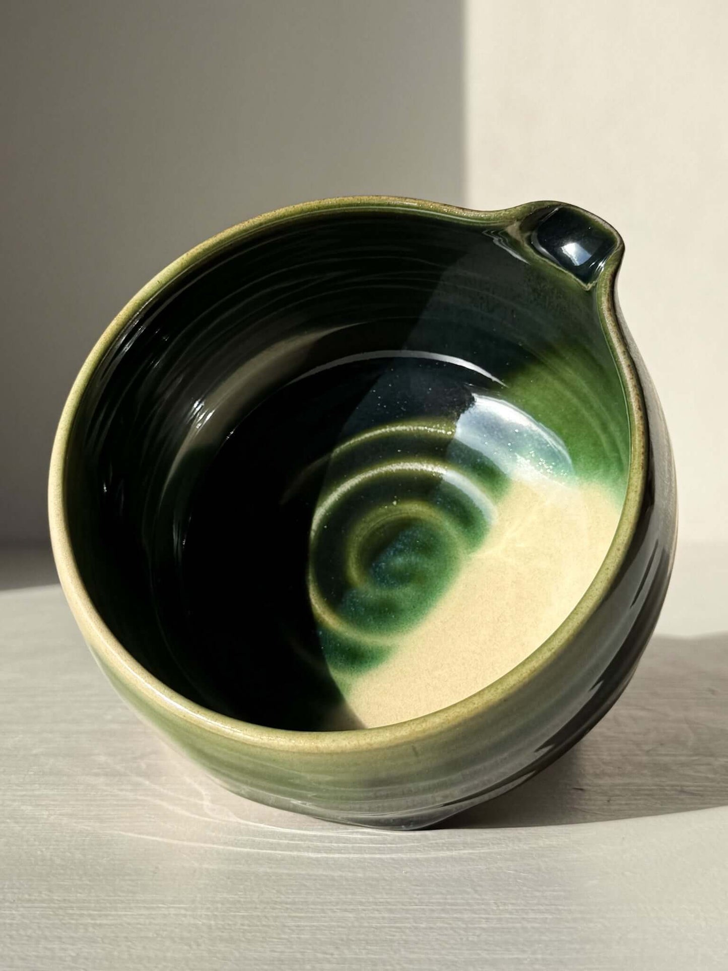 Matcha Bowl with Spout – Mori #05, handmade ceramic with natural stoneware and layered green-brown glaze, wheel-thrown design.
