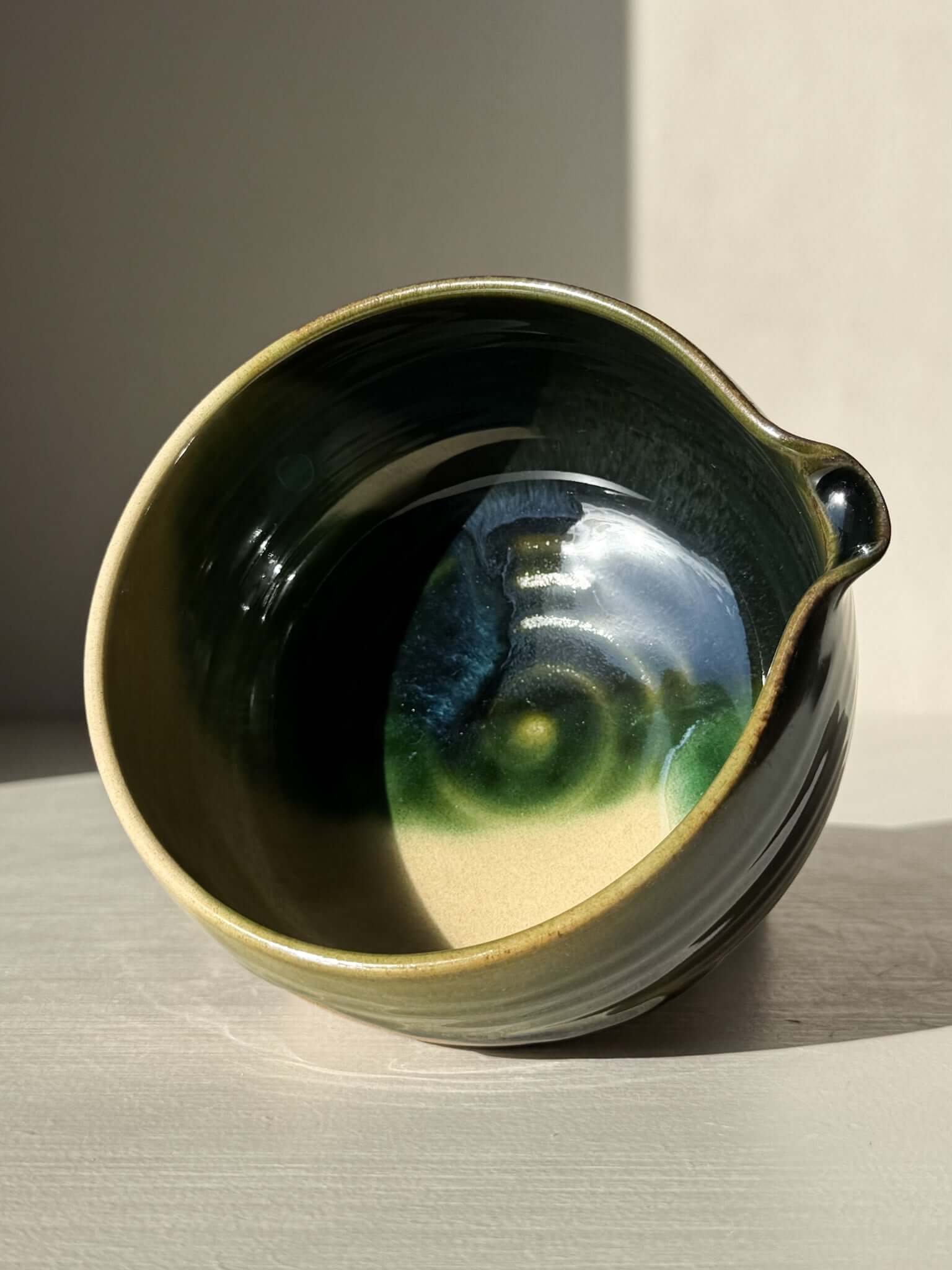 Matcha Bowl with Spout – Mori #02, handmade ceramic with green and brown glaze finish. Perfect for tea enthusiasts.