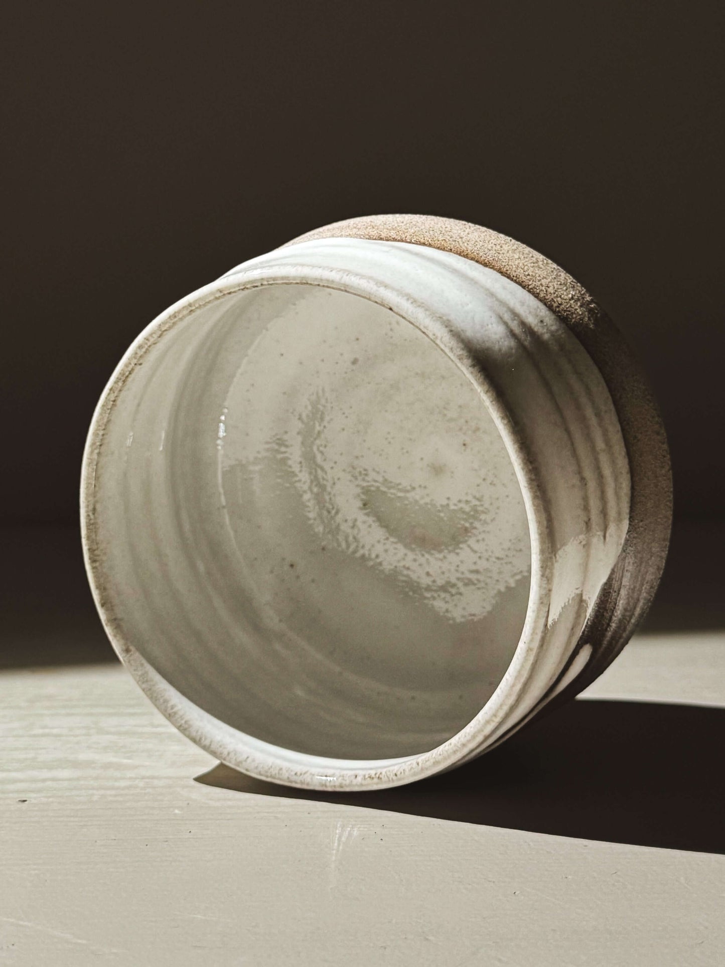 Matcha Bowl – Yuki Ash #01 with glossy white glaze on ash-grey clay, showcasing its soft curves and unique handcrafted design.