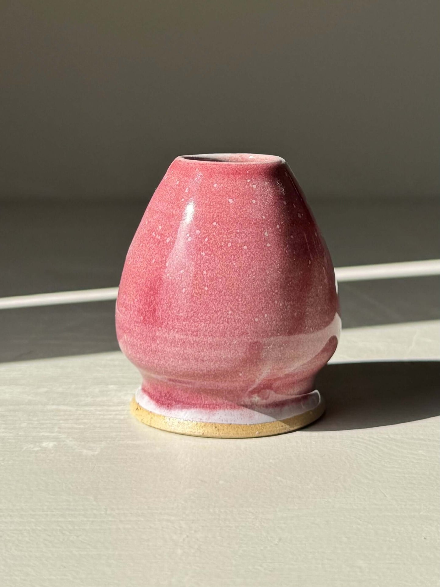 Handmade ceramic Whisk Holder - Ume Series in pink, designed to maintain bamboo whisk shape, inspired by Japanese plum blossom.