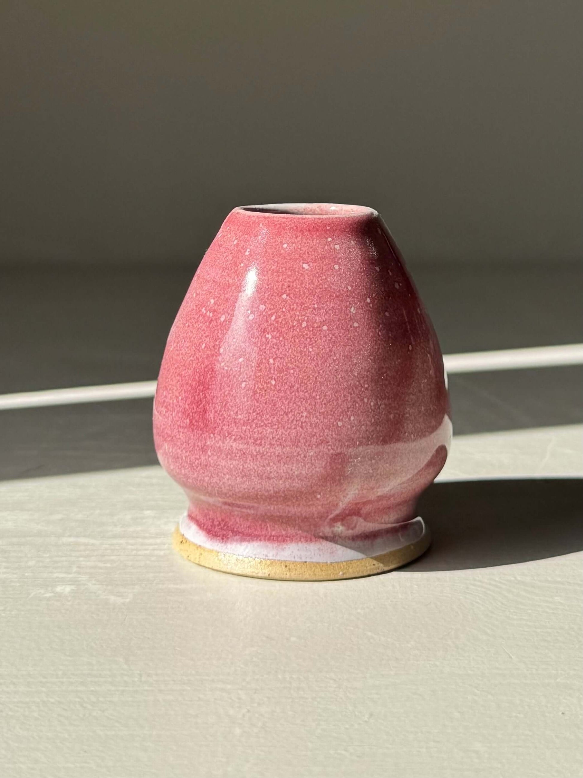 Handmade ceramic Whisk Holder - Ume Series in pink, designed to maintain bamboo whisk shape, inspired by Japanese plum blossom.