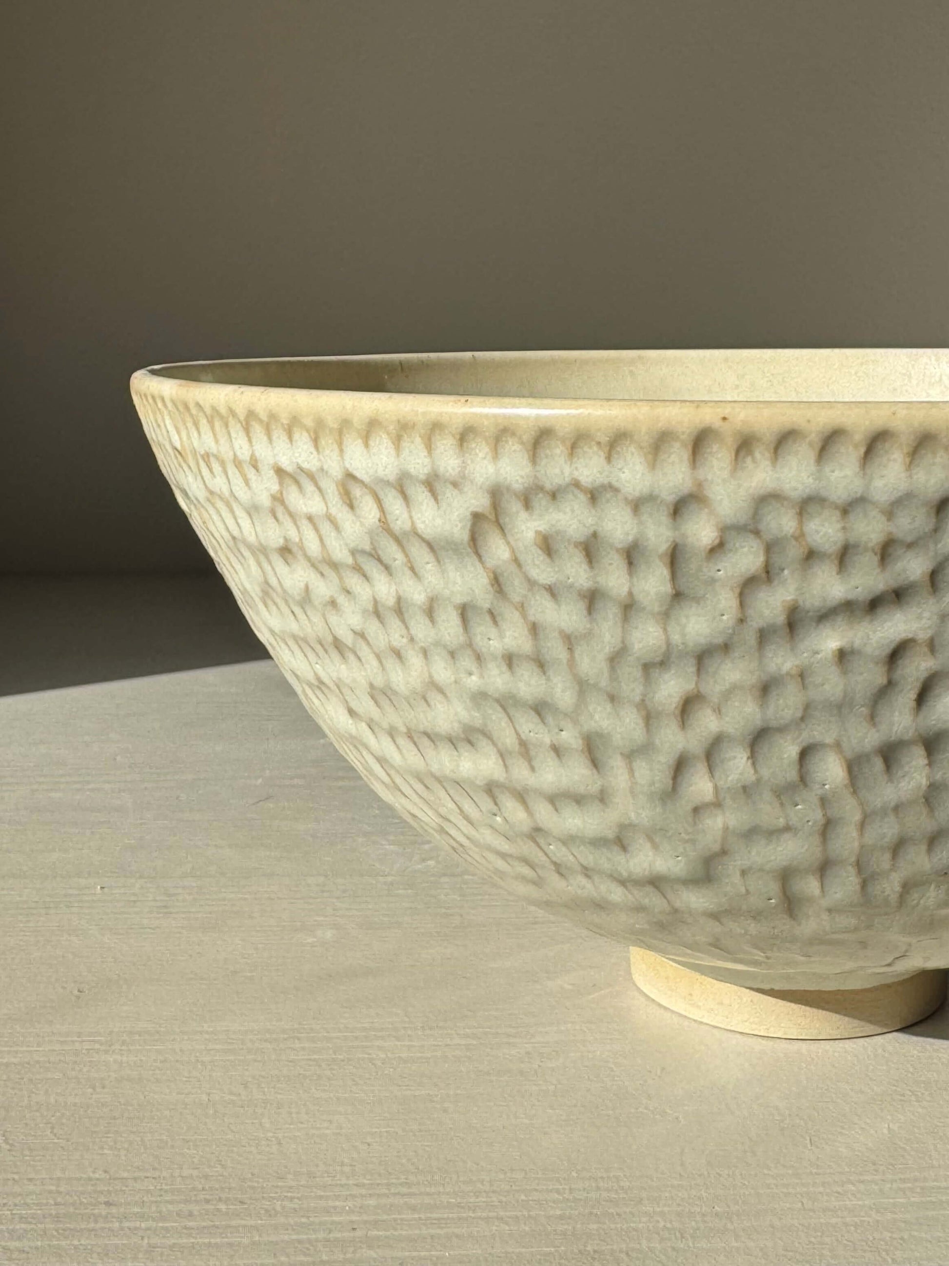 Medium Bowl – Moonstone handmade ceramic with creamy satin finish and carved texture, elegant addition to any table setting.