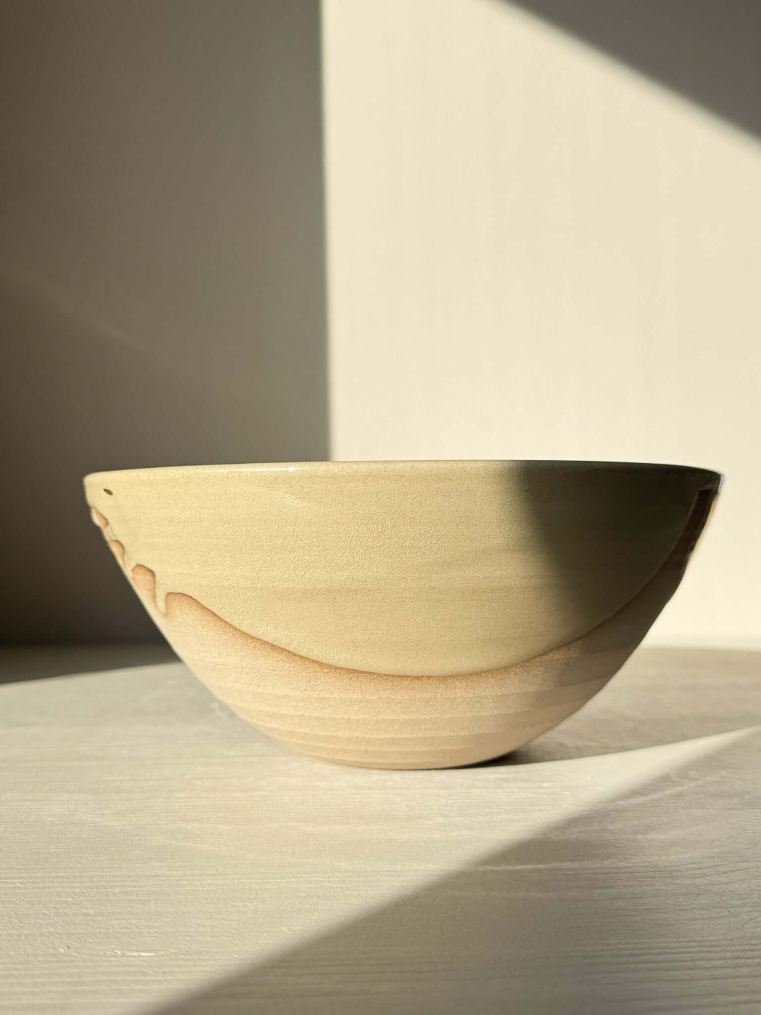 Handmade ceramic Medium Bowl - Mori #02 with rich green glaze and toffee-colored clay rim, inspired by forest depth and calm.