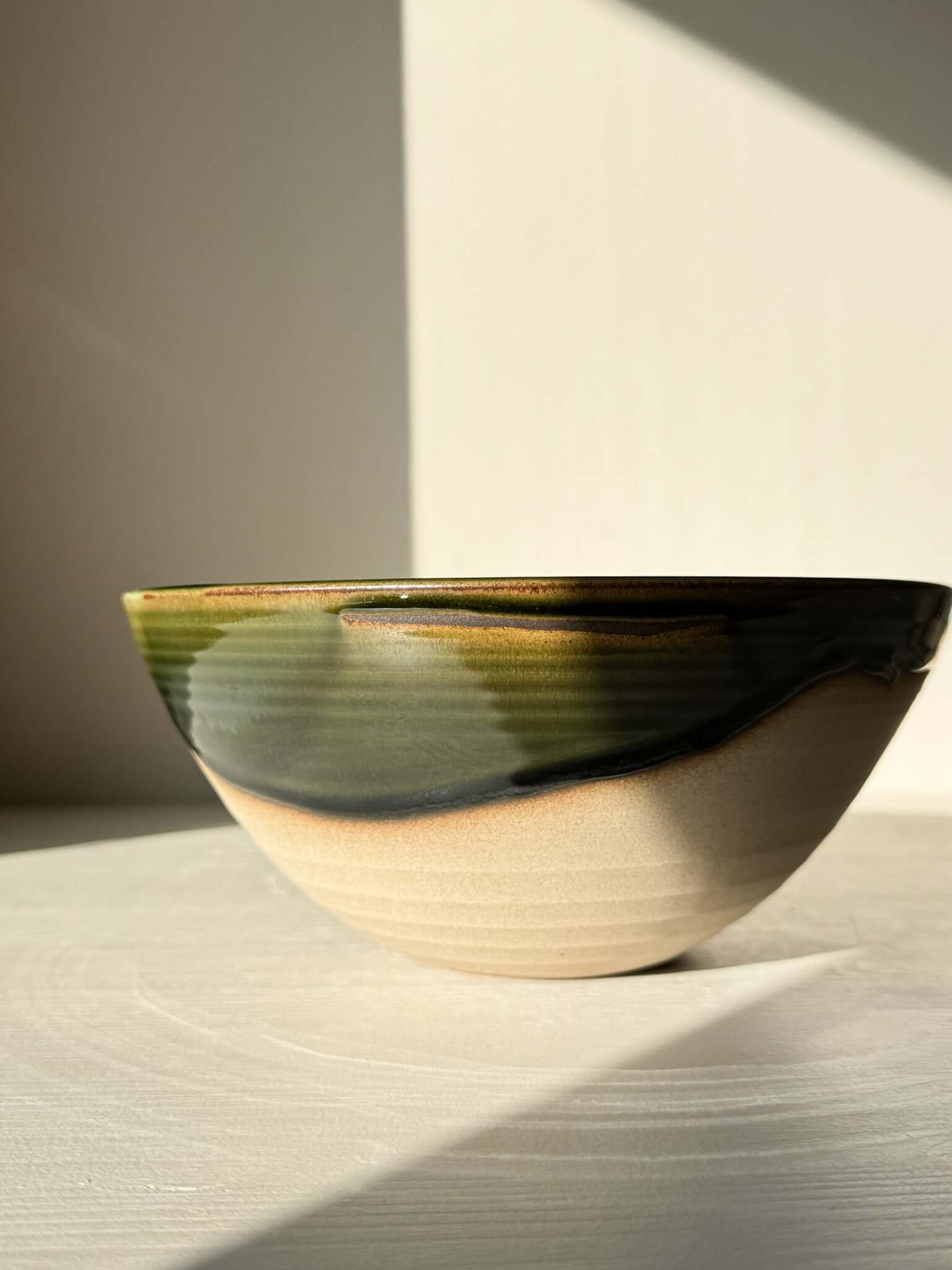 Handmade ceramic Medium Bowl - Mori #02 with green glaze and toffee clay rim, part of the Mori Series, inspired by forest tranquility.