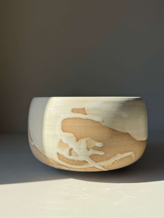 Medium Bowl - Yuki #01, a handmade ceramic with white glaze on toffee clay, showcasing unique curves and natural stoneware texture.