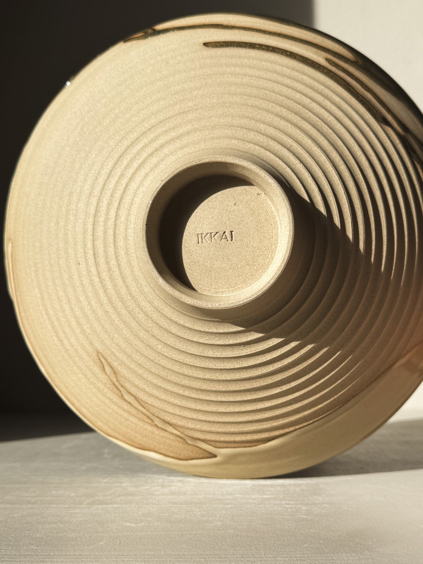 Medium Carved Bowl - Inyo #02 with sculptural carved exterior and raw clay showcasing natural flowing drips along the rim.