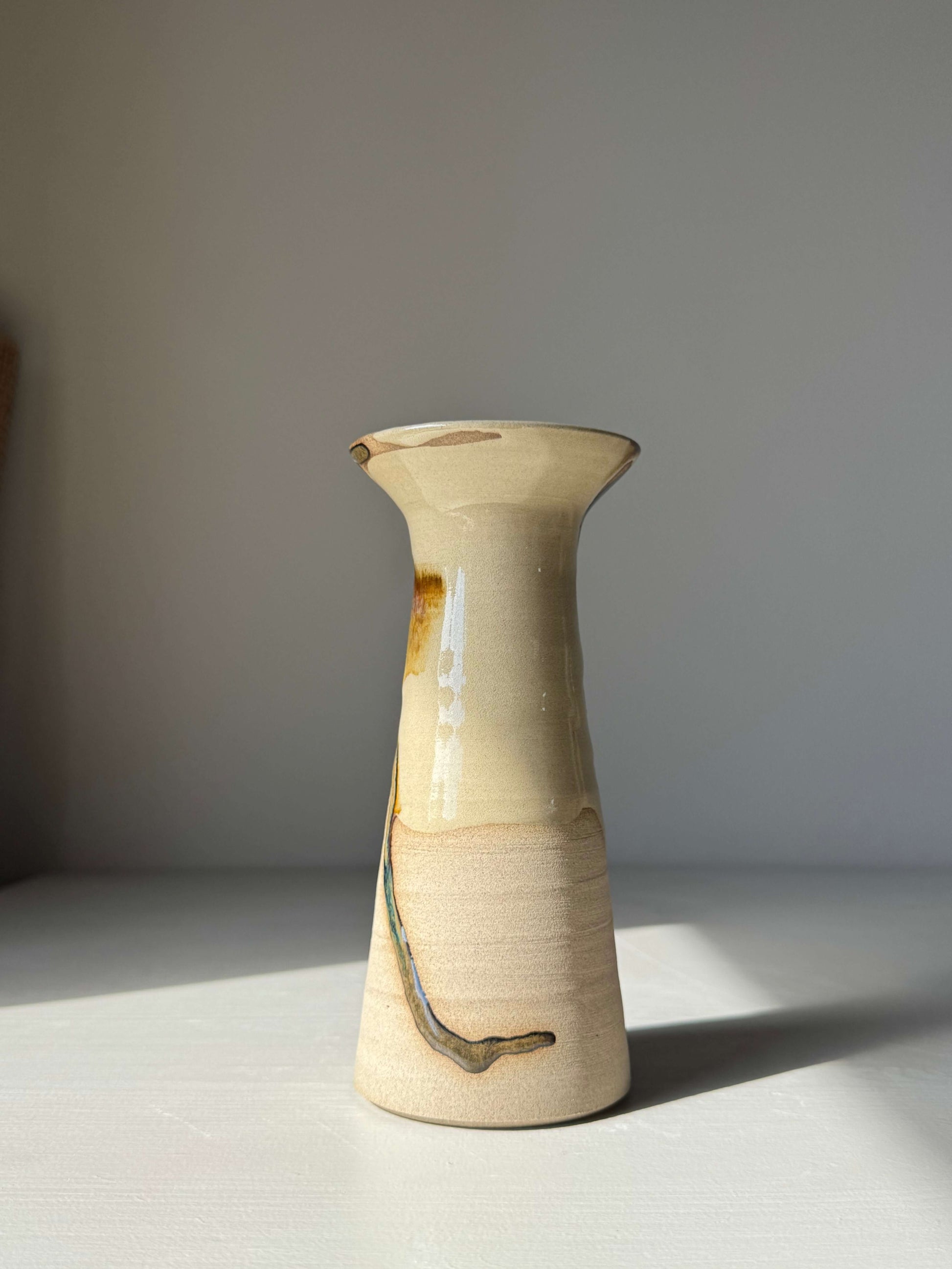 Medium Vase – Inyo Series #03, handmade ceramic, tall sculptural vase with unique glaze, stands on a light surface.