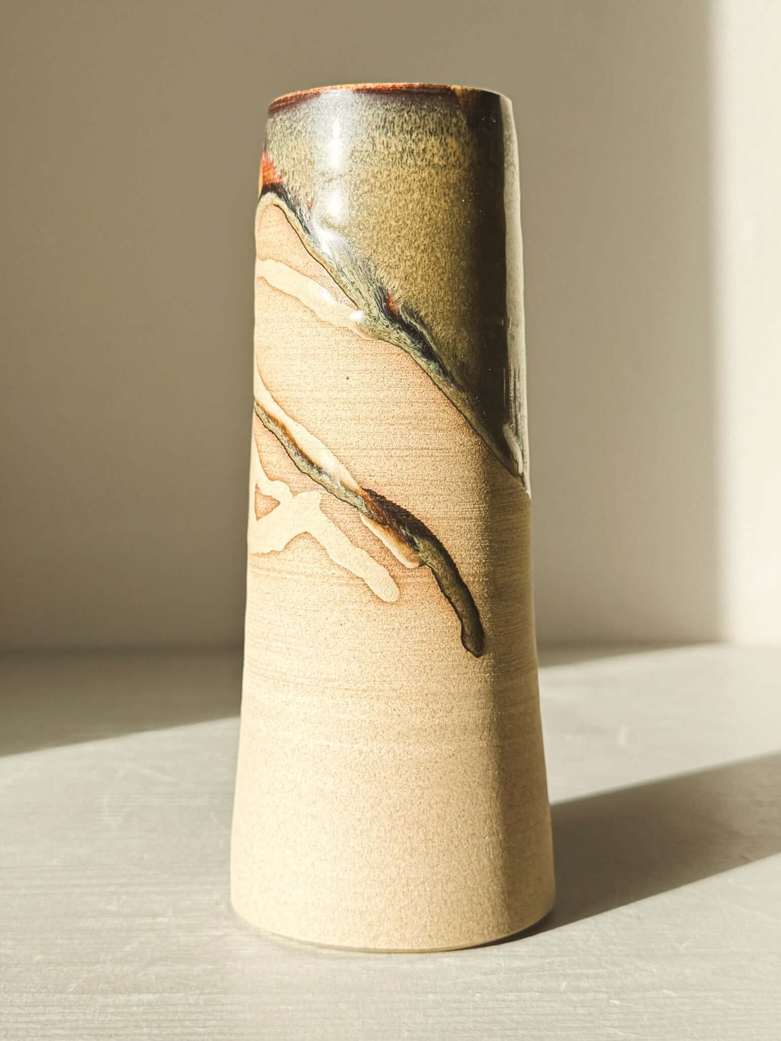 Medium Vase - Inyo Series, tall cylindrical vase with raw texture and flowing glaze in earthy tones, approx. 19cm height, unique decor piece.