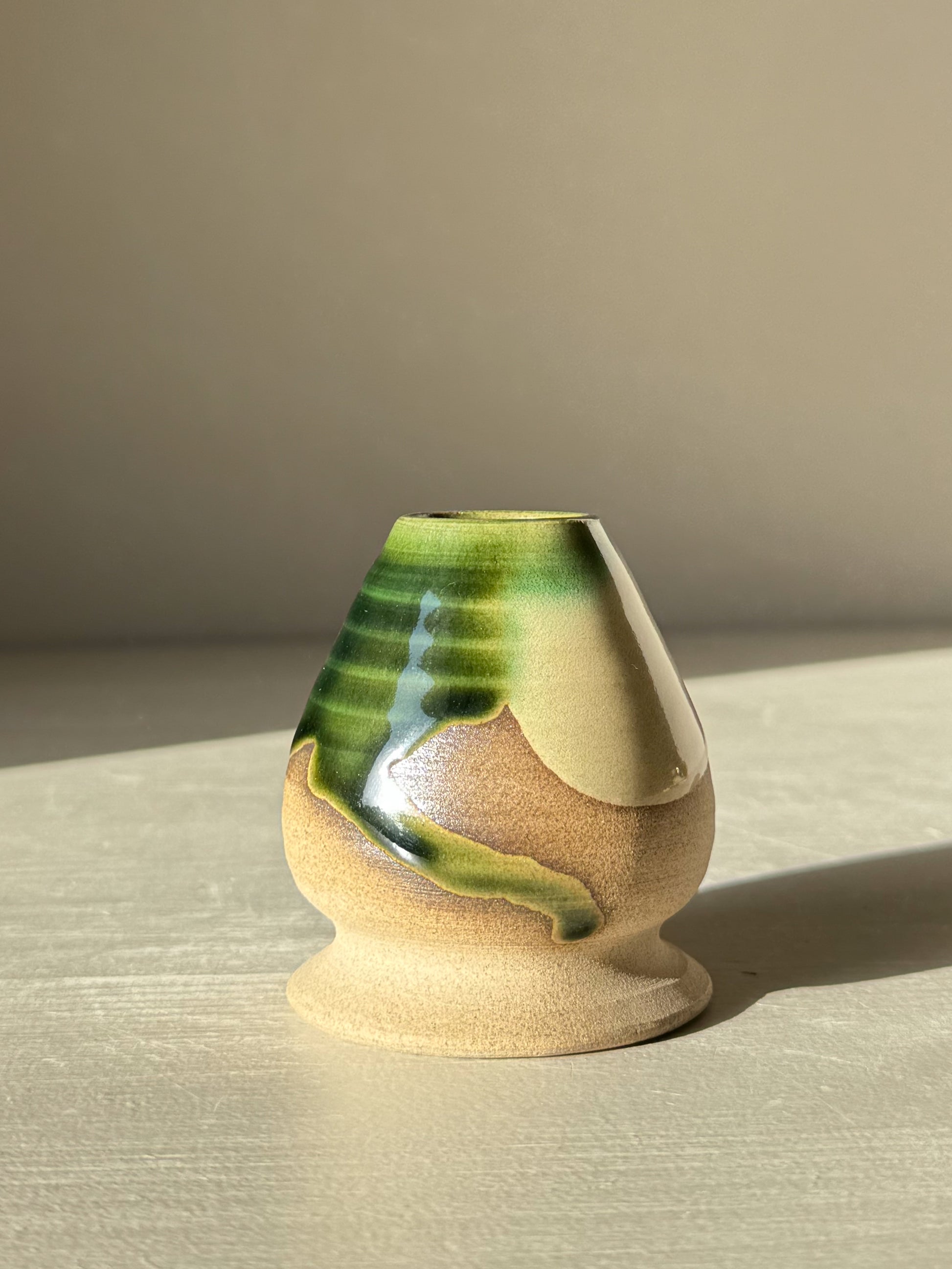 Handmade Whisk Holder - Mori in warm clay with natural green glaze, ideal for bamboo matcha whisk care.