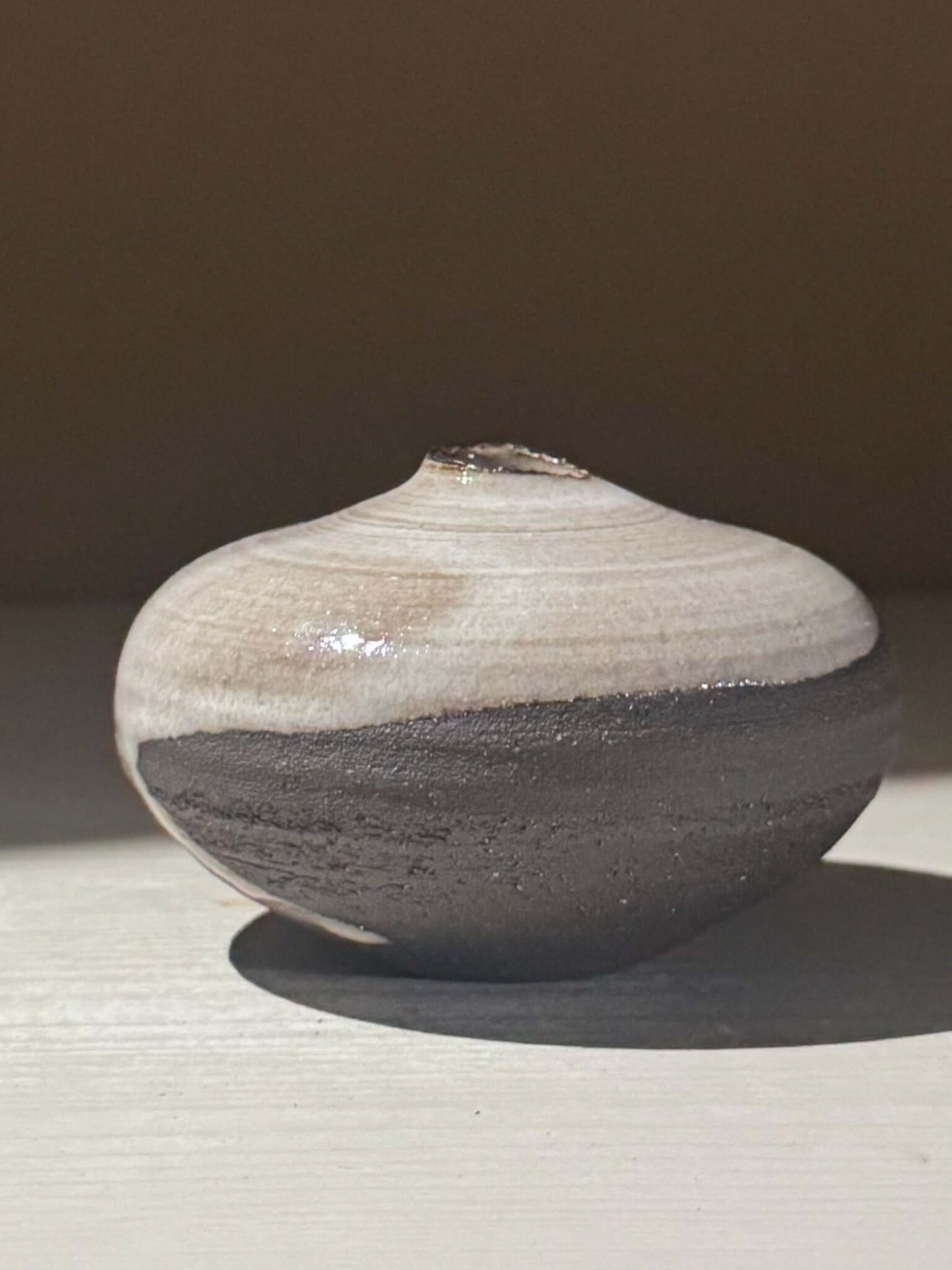 Orb Vase – Yuki Black #13 with unique glaze and round shape