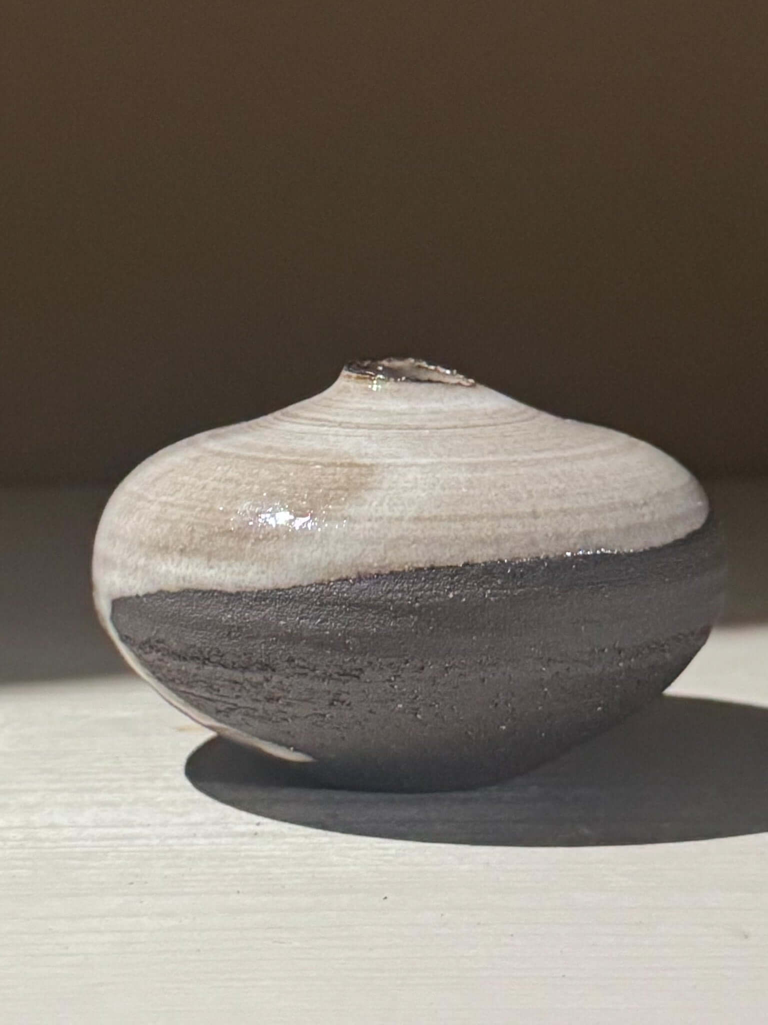 Orb Vase – Yuki Black #13 with unique glaze and round shape