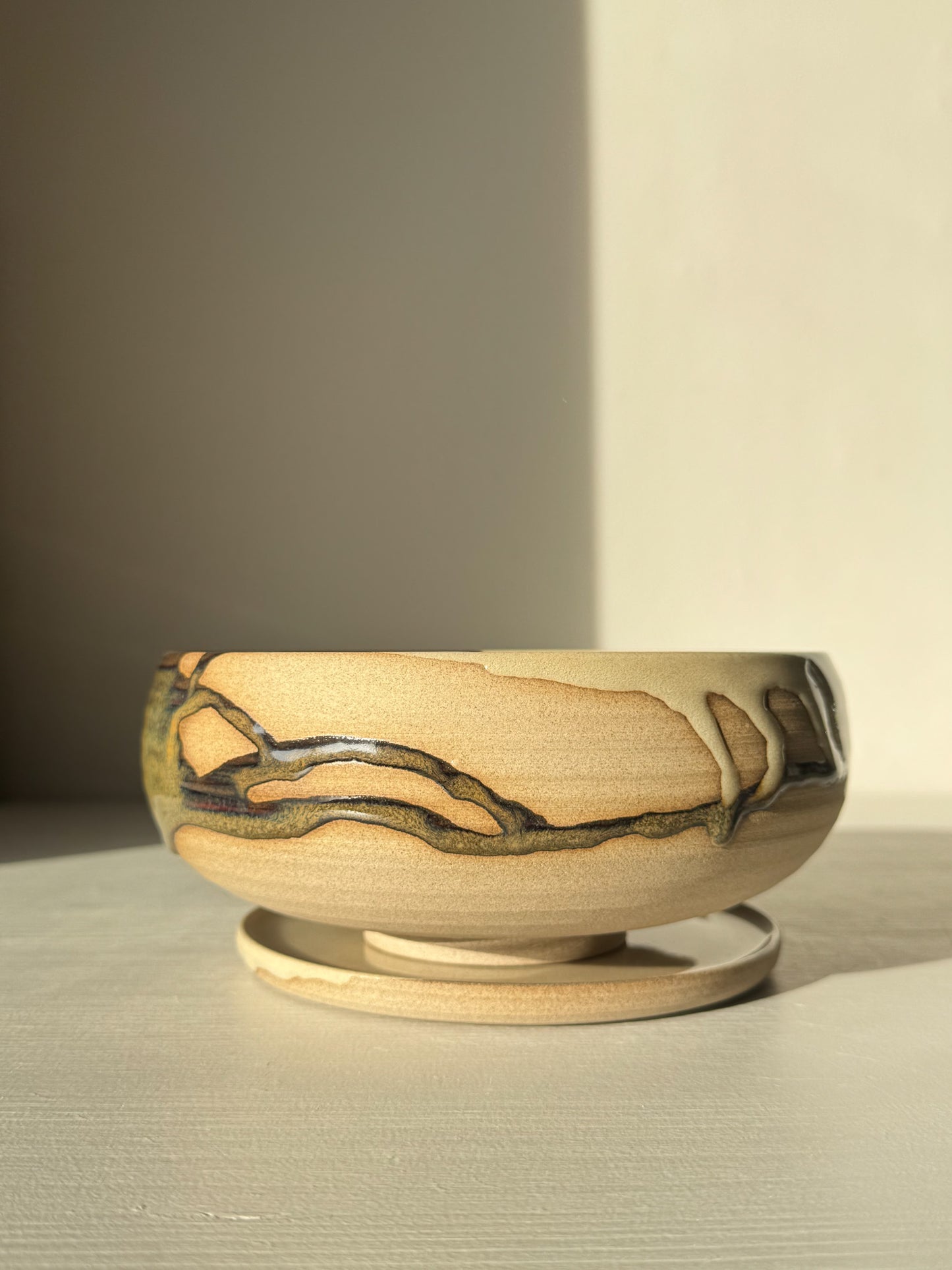 Rounded Berry Bowl - Inyo #02 with a drip plate, in earthy tones, ideal for serving fresh fruits, crafted with glossy tenmoku glaze.