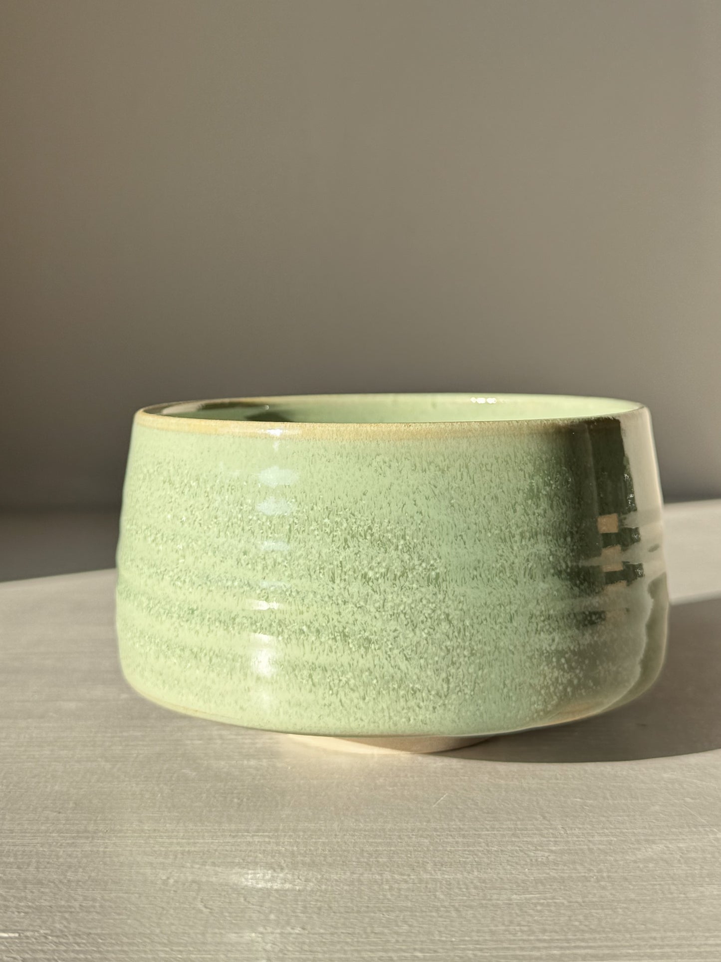 Matcha Bowl – Sage Glaze #02 with a glossy sage-green finish, designed for whisking matcha smoothly, handmade and unique in design.