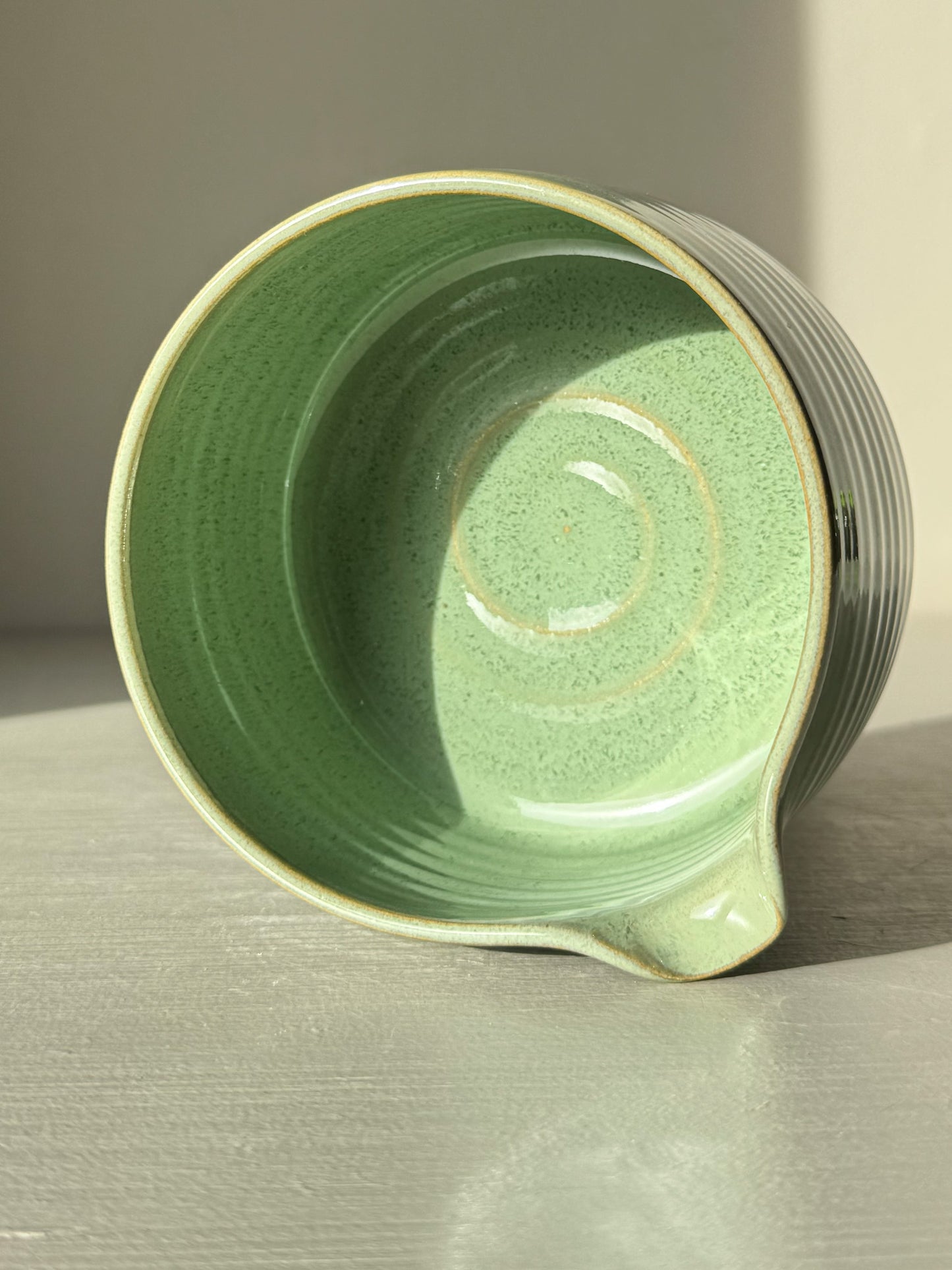 Matcha Bowl Spout – Sage #01 with sage-green glaze and open form, perfect for whisking matcha. Curved design for comfortable grip.