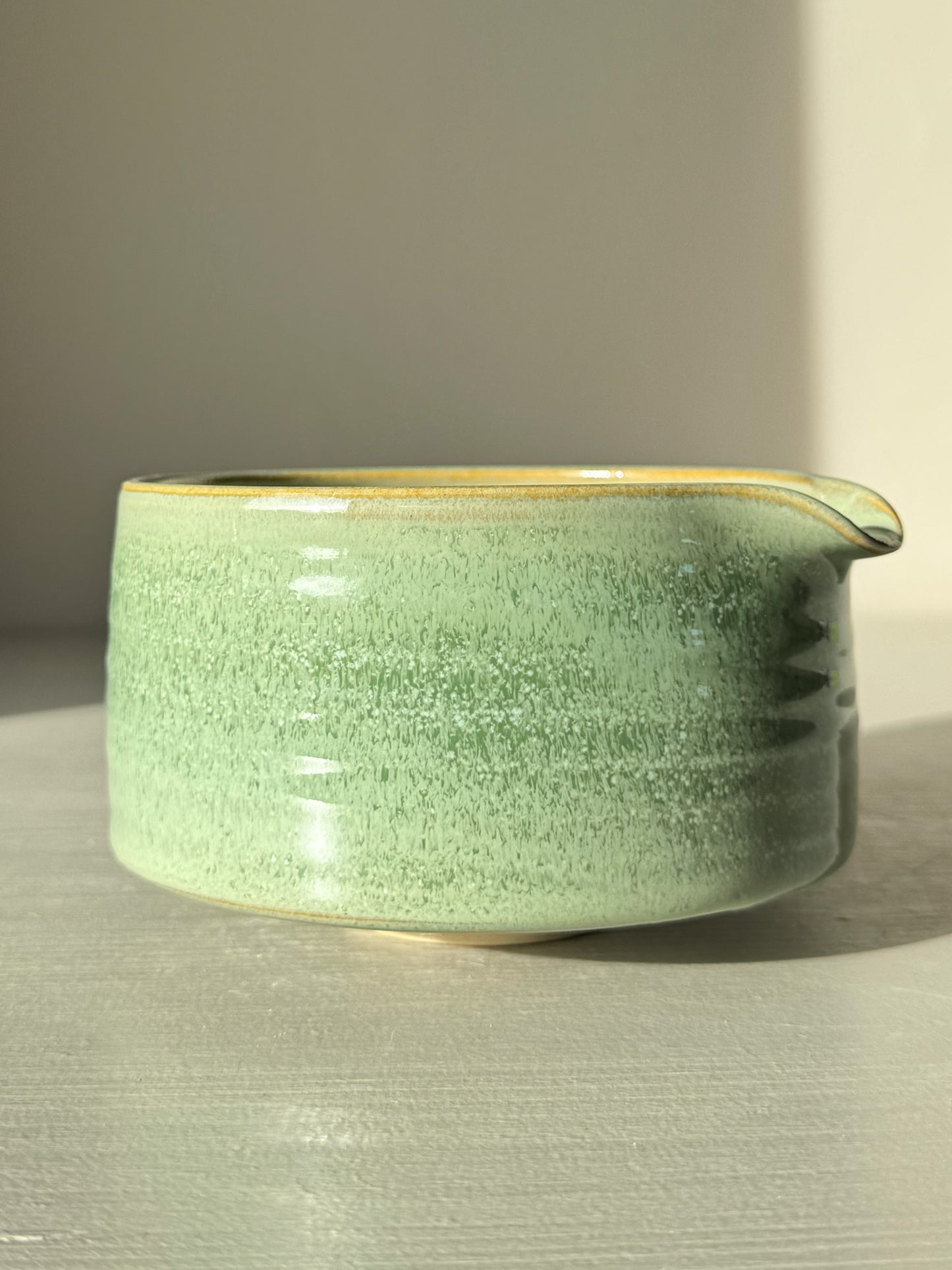 Matcha Bowl Spout – Sage #01 with soft sage-green glaze and open form design, ideal for whisking matcha into a smooth blend.
