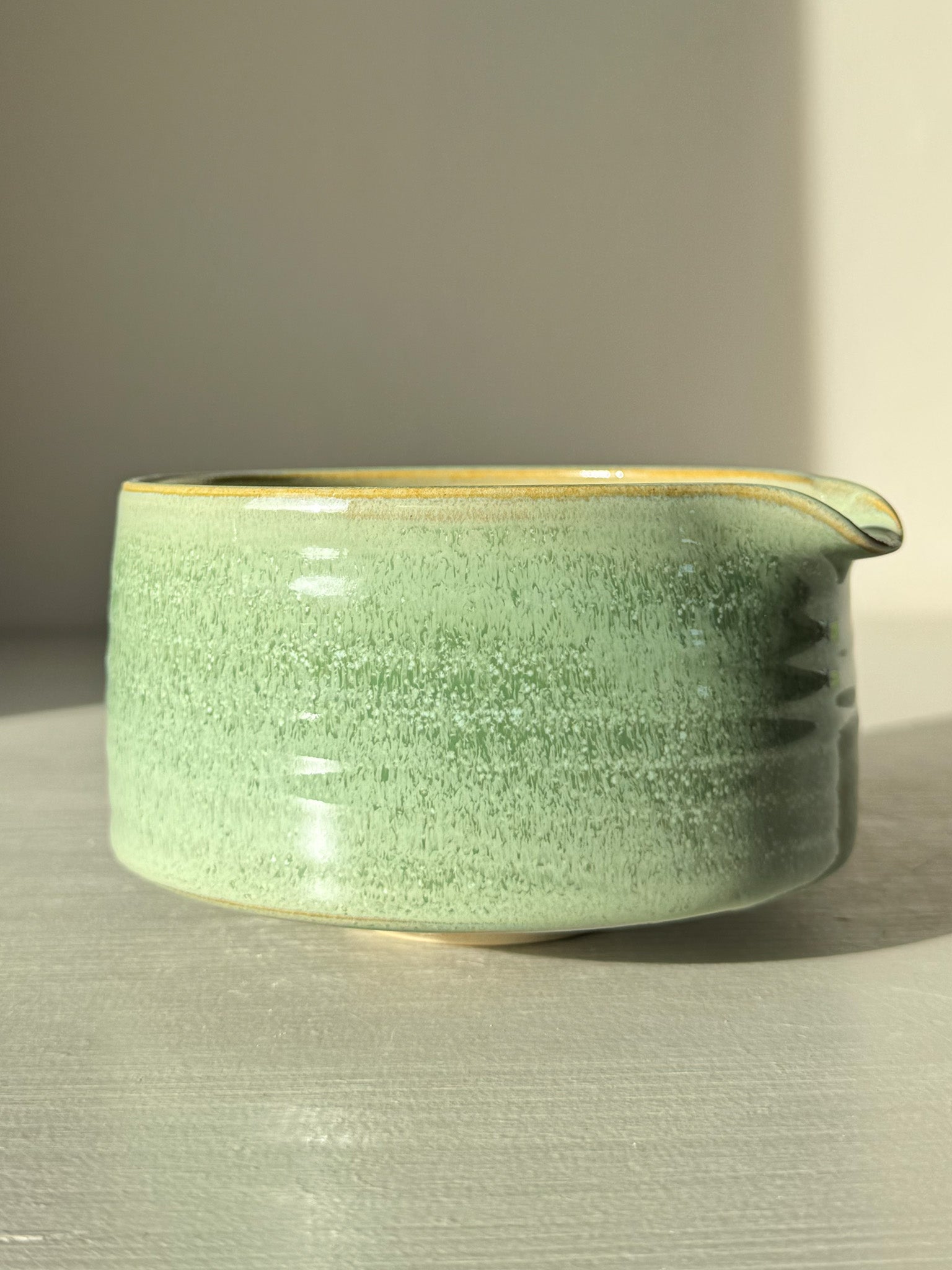 Matcha Bowl Spout – Sage #01 with soft sage-green glaze and open form design, ideal for whisking matcha into a smooth blend.