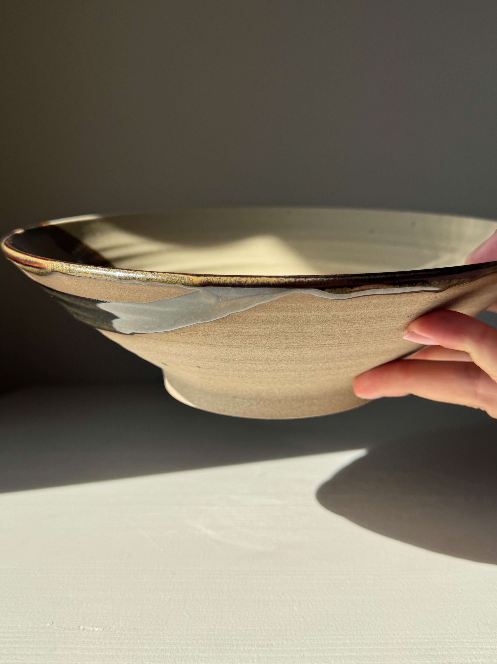Handmade ceramic Salad/Pasta Plate – Inyo with clear glaze and Tenmoku accents, 23 cm diameter and 6 cm high.
