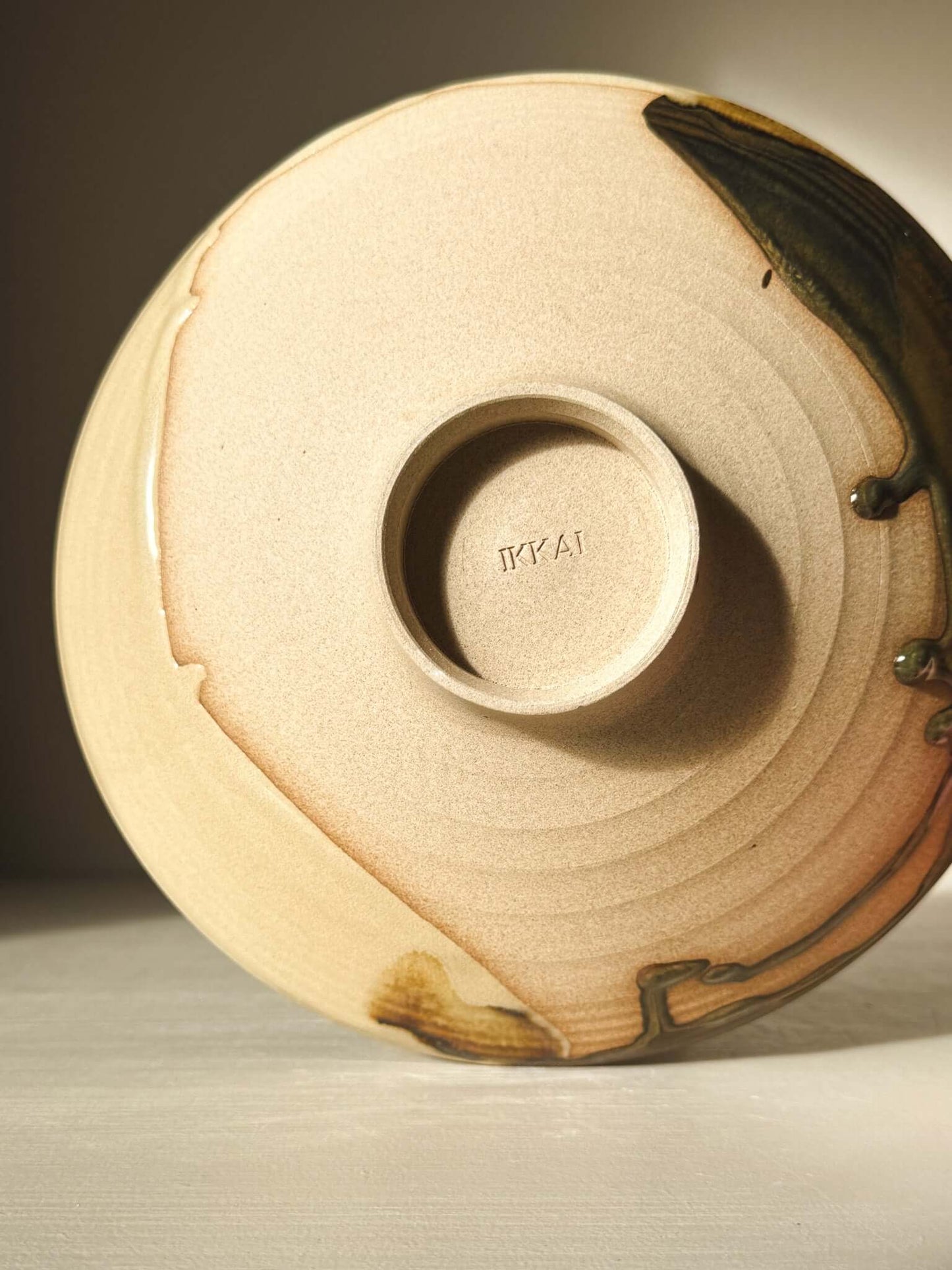 Base of the Serving Bowl - Inyo Series #01 showing unique ceramic glazes, highlighting handmade craftsmanship.