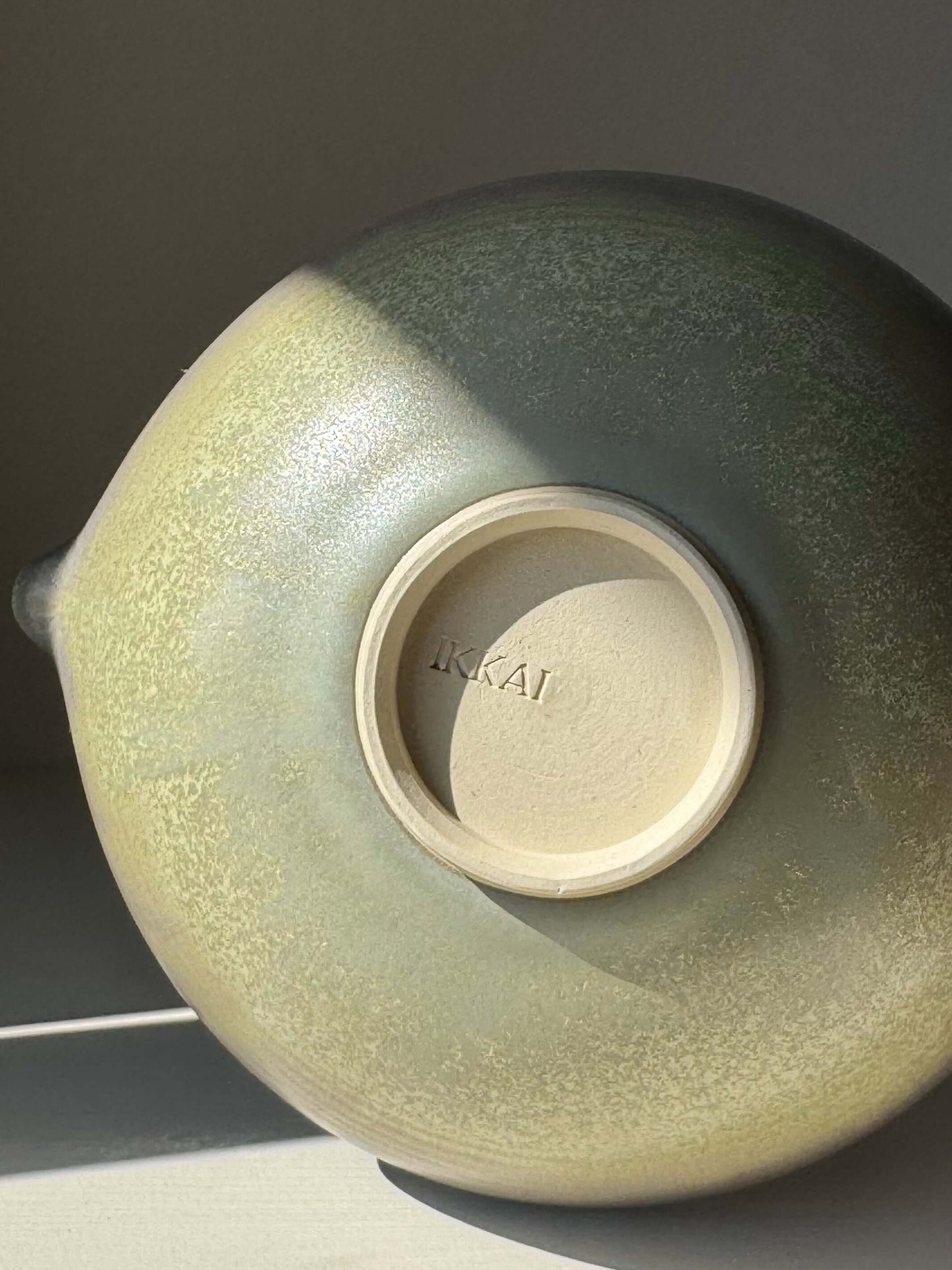 Bottom view of handmade ceramic Small Pouring Bowl – Satin Blue with velvety matte-satin finish and subtle glaze transitions.