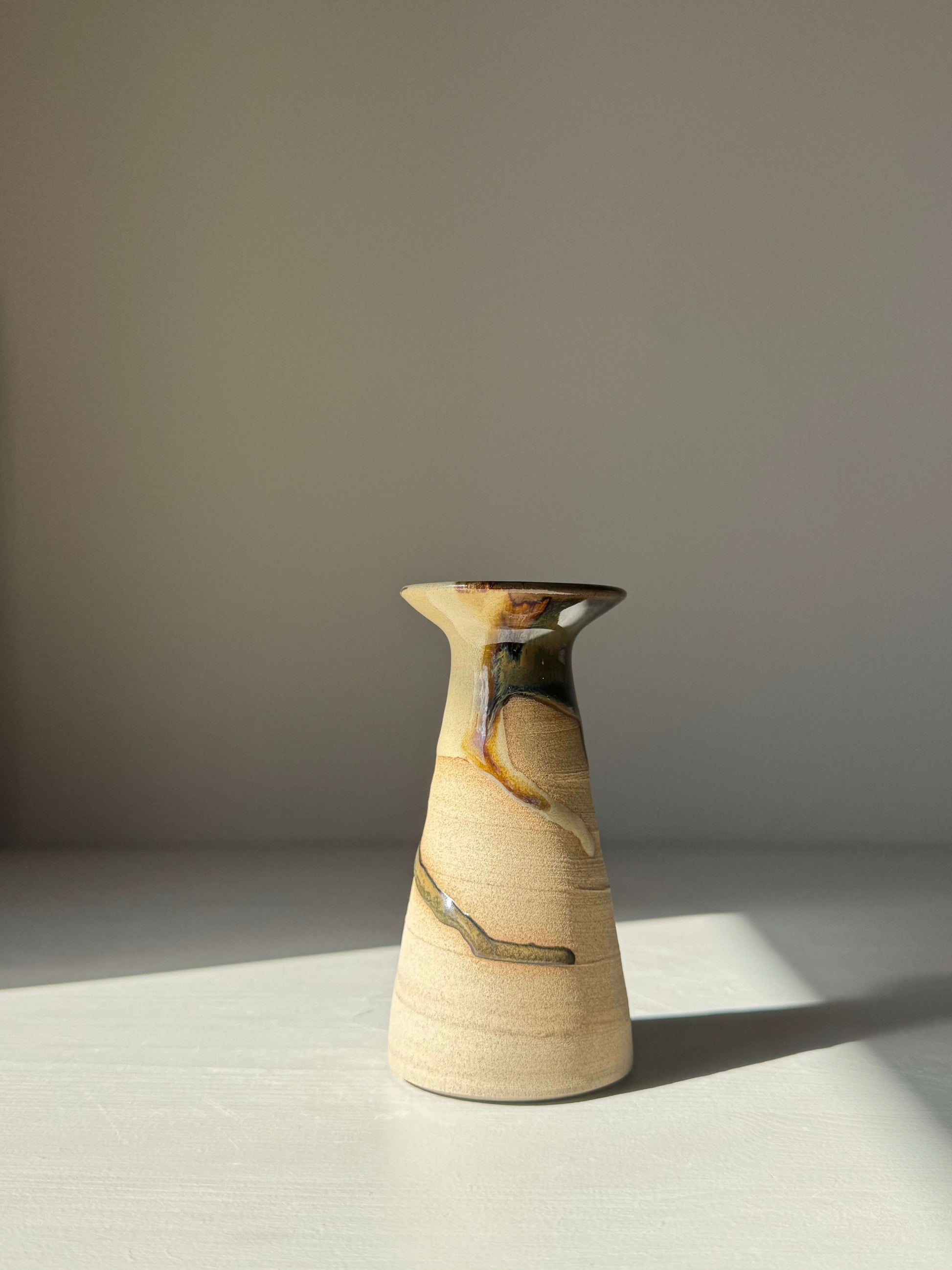 Small Vase – Inyo #01, handmade ceramic, featuring a tall flared design with unique glaze patterns, showcasing artisanal craftsmanship.