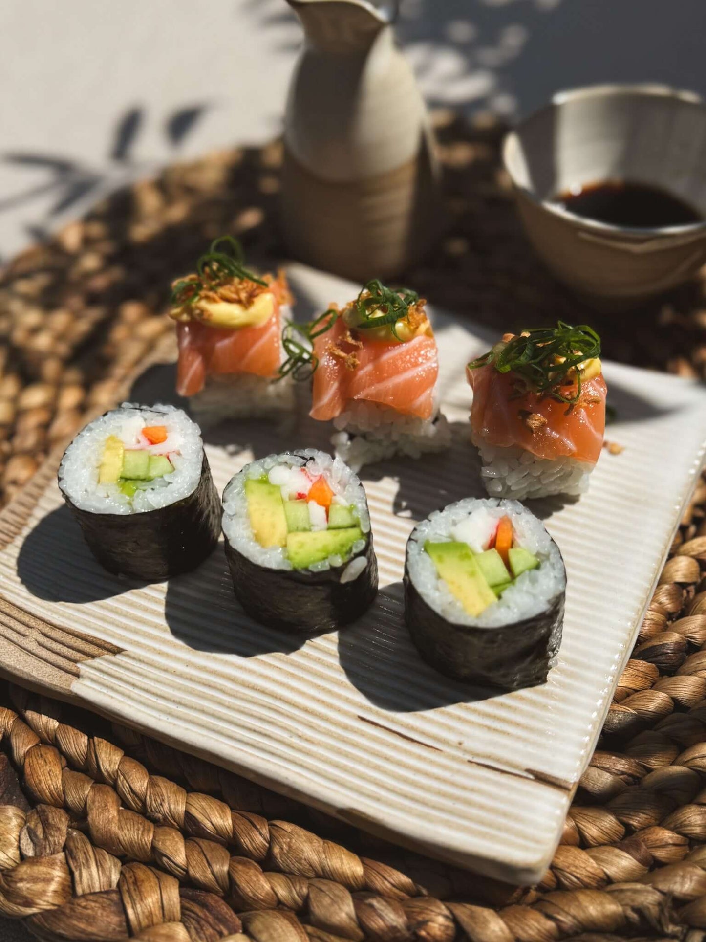 Sushi Plate – Yuki #01 displaying sushi rolls, showcasing handmade ceramic craftsmanship.