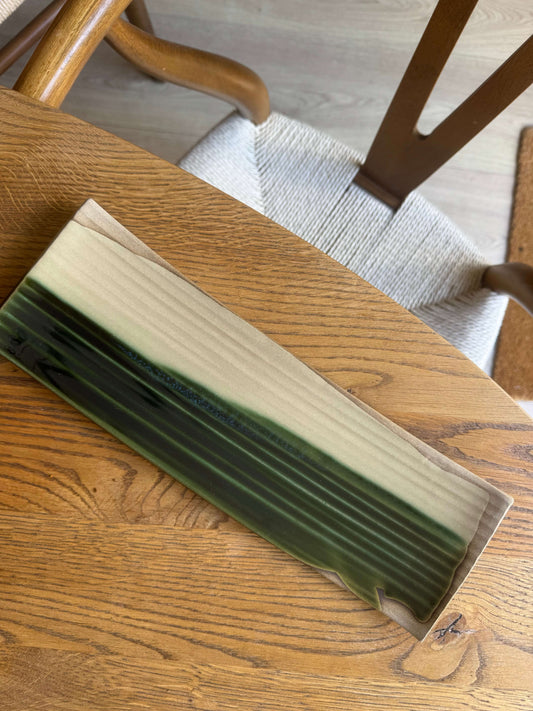 Sushi Plate – Mori Series #01 featuring handmade ceramic with green Mori glaze on a wooden table.