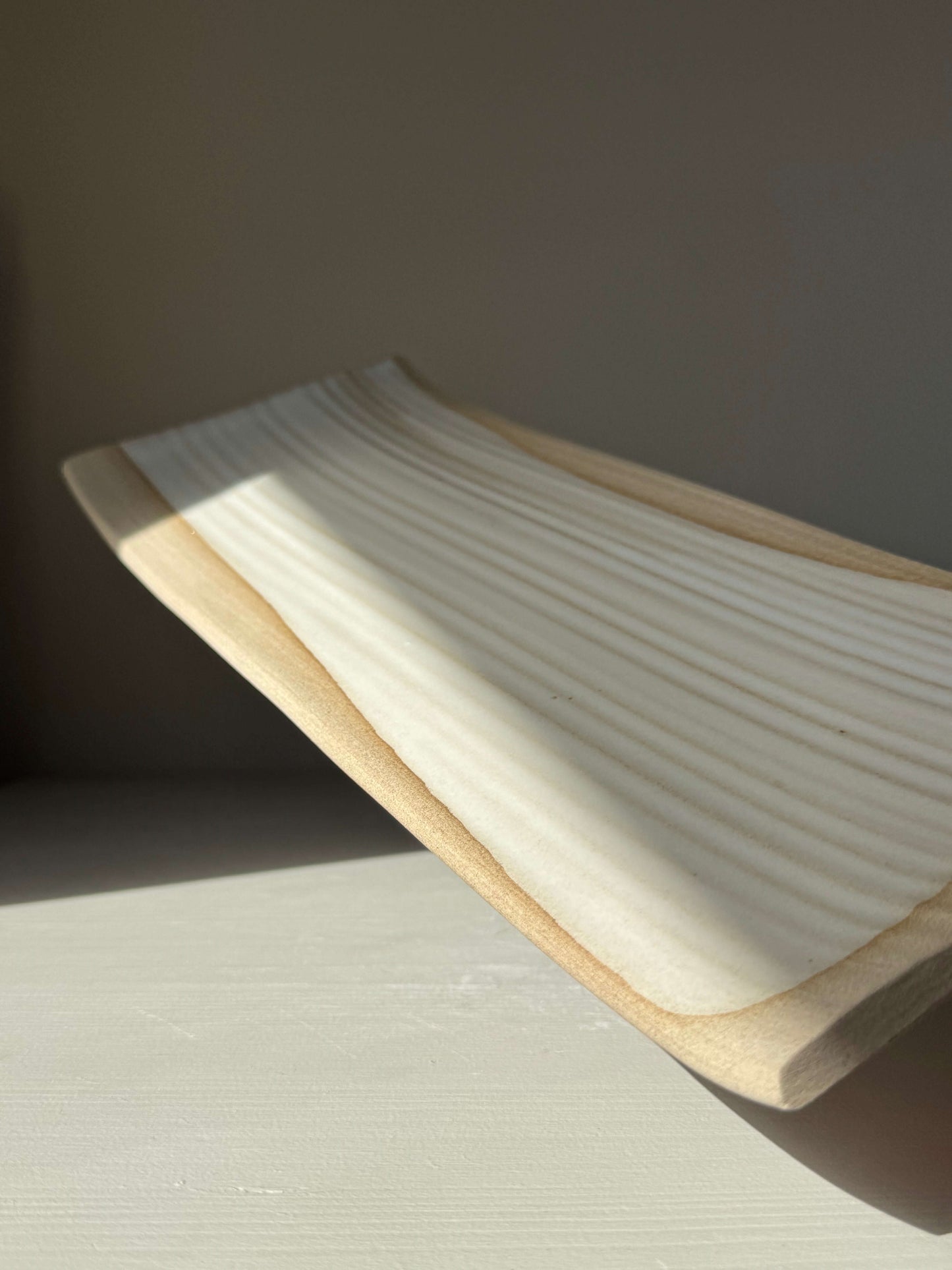 Handmade ceramic Sushi Plate – Yuki Series #02 with a long rectangular design and soft curves, suitable for sushi or decor.