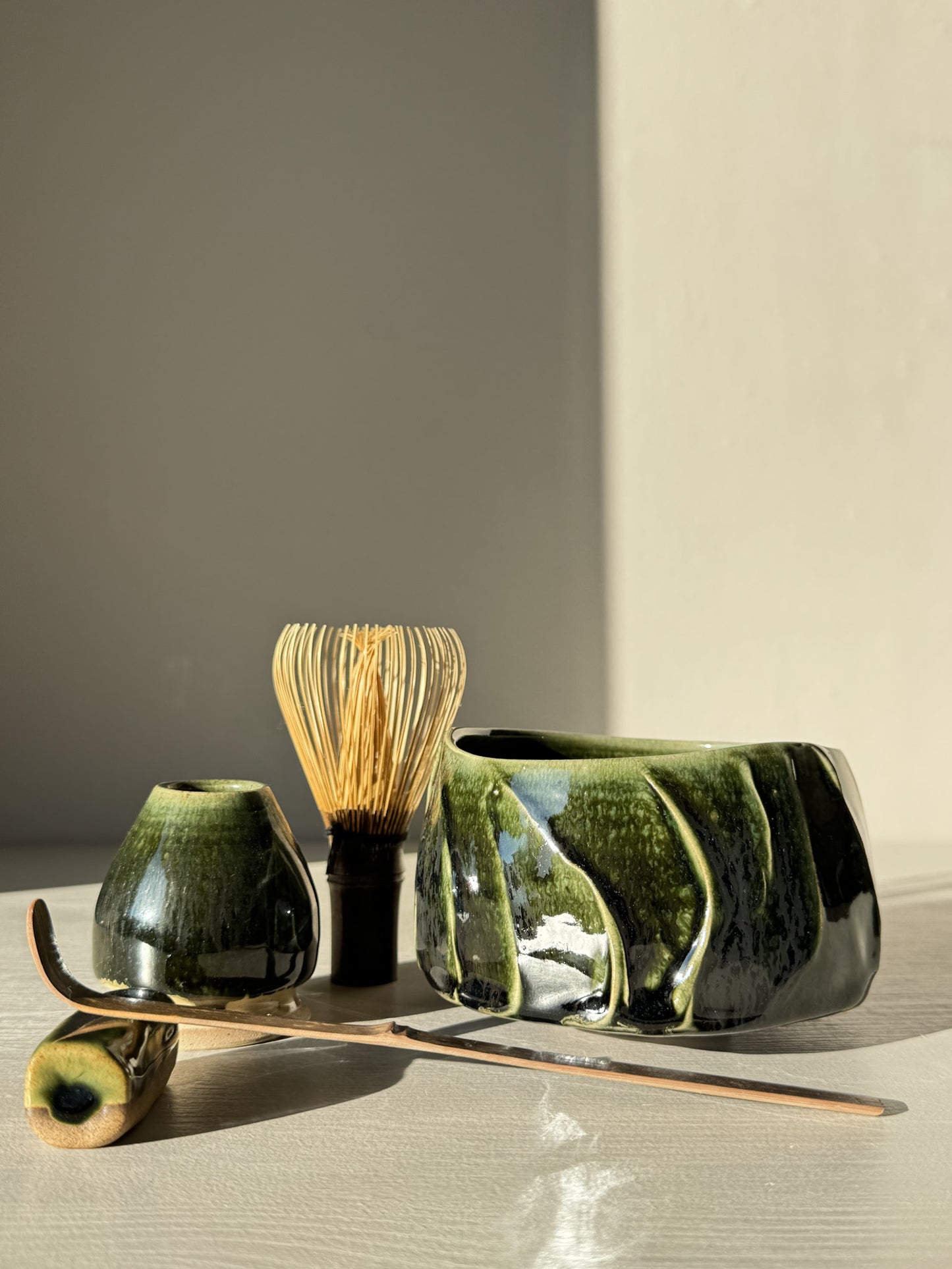 Textured Matcha Bowl - Hinoki #10 with green glaze and unique textures, part of the Hinoki Series, enhancing matcha rituals with natural beauty.