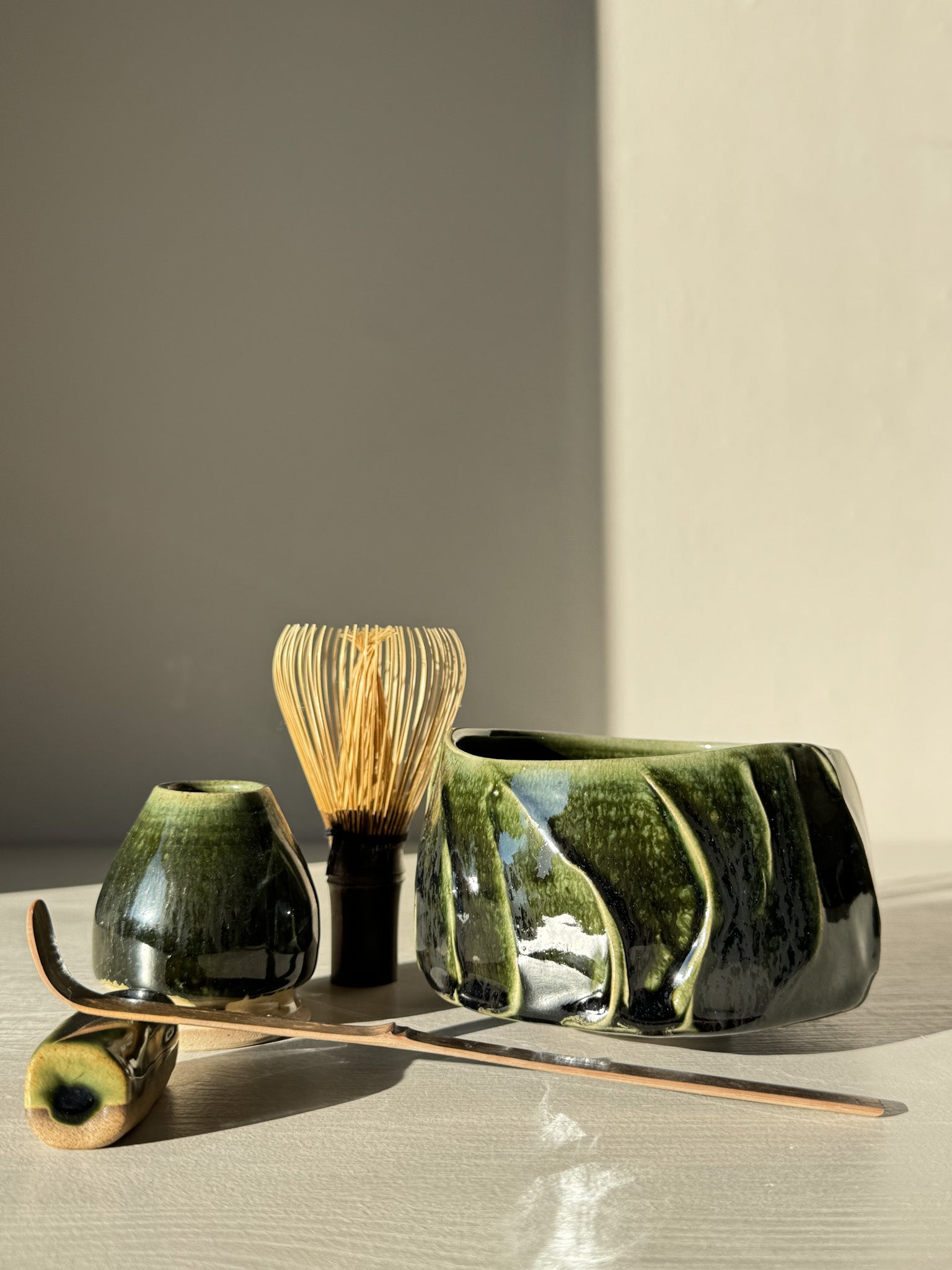 Textured Matcha Bowl - Hinoki #10 with green glaze and unique textures, part of the Hinoki Series, enhancing matcha rituals with natural beauty.