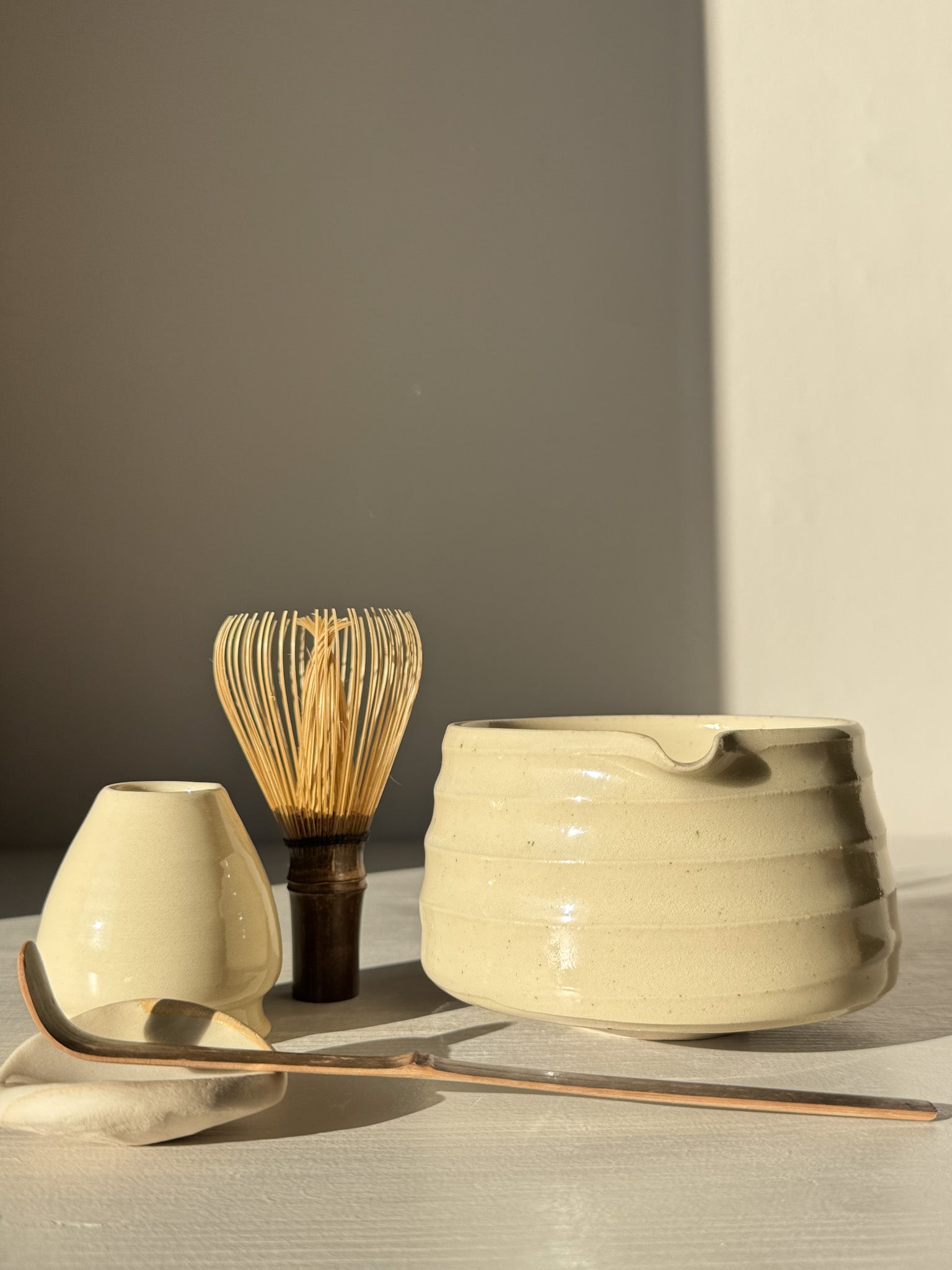 Textured Matcha Bowl Spout - Clear #02 with whisk, spoon, and accessory under natural light