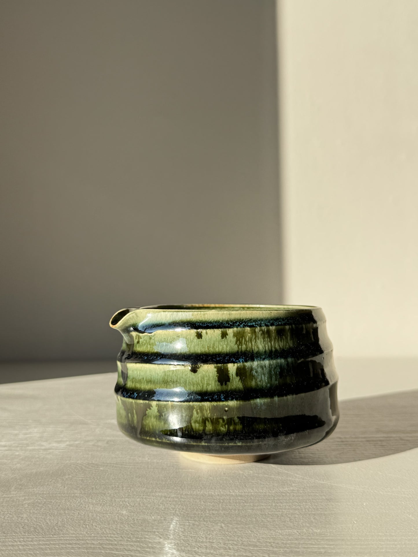 Textured Matcha Bowl Spout - Hinoki #04 in glossy green glaze with pouring spout and subtle ridges, enhancing tactile feel and aesthetics.