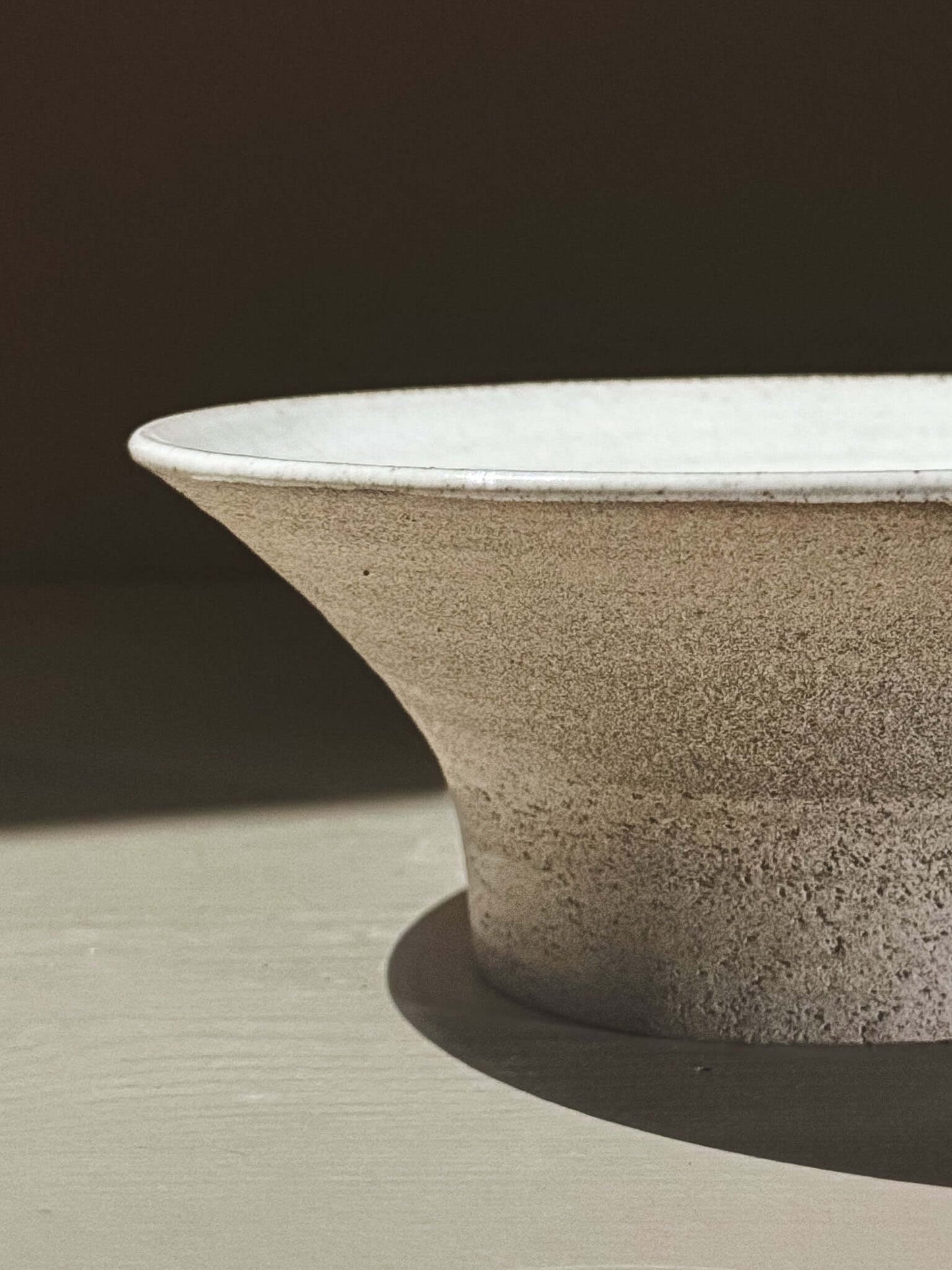 Bowl - Yuki Ash with ash-grey clay and glossy white glaze, showcasing soft curves and natural glaze movement.