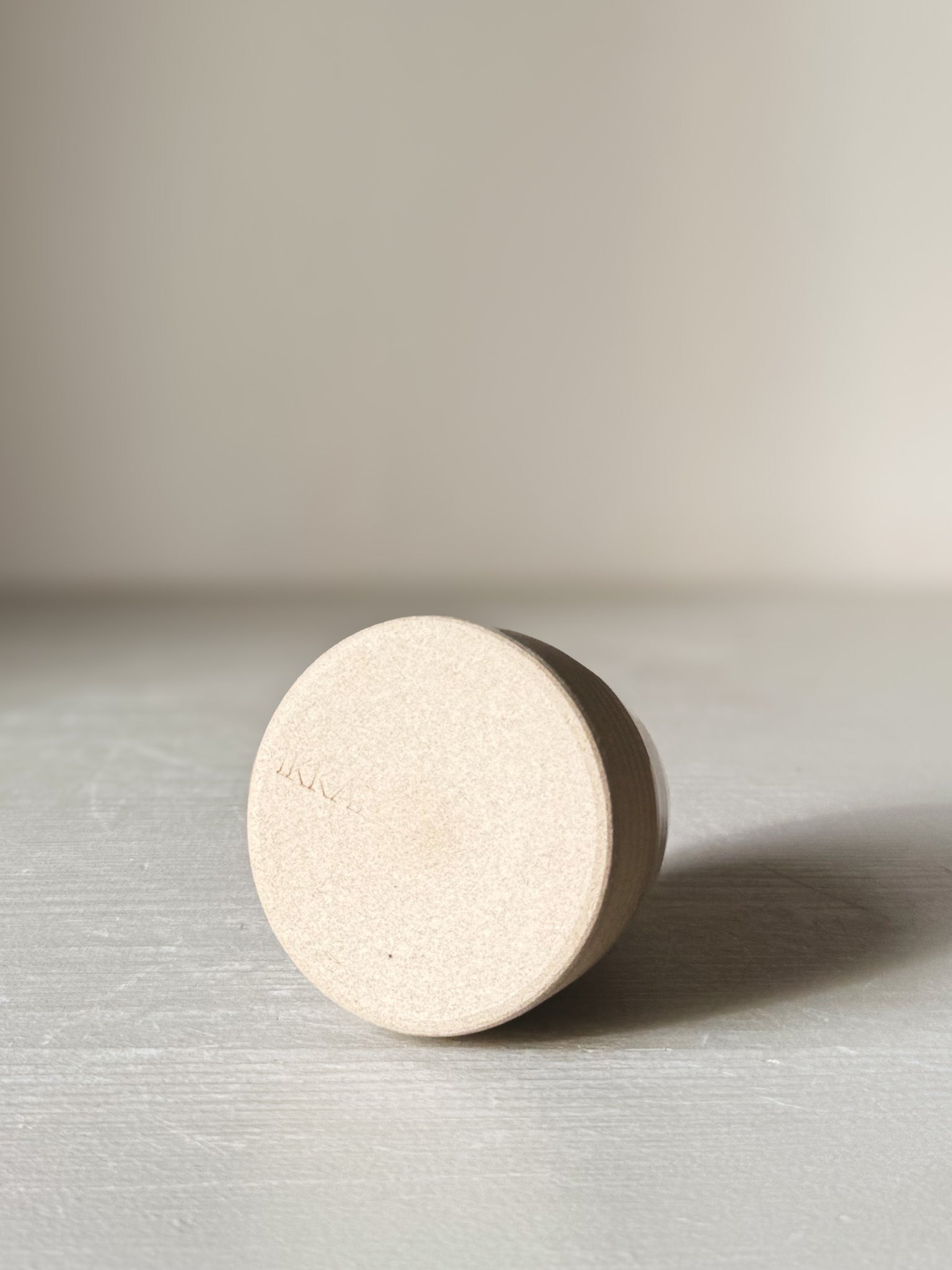 Base view of Small Vase – Yuki #02 showcasing matte raw clay finish and subtle design.