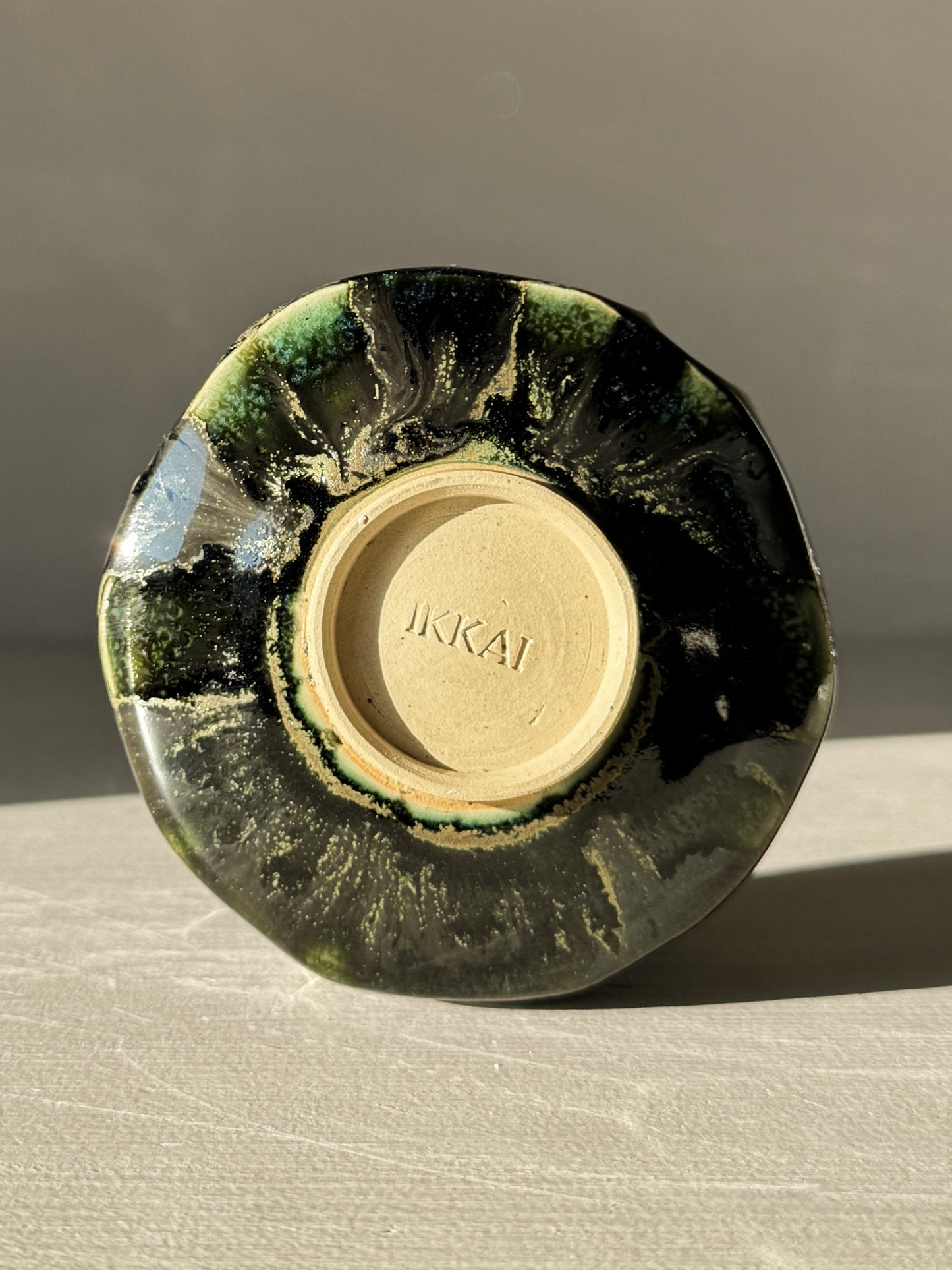 Underside view of Yunomi Cup - Hinoki #03 with green glaze pattern