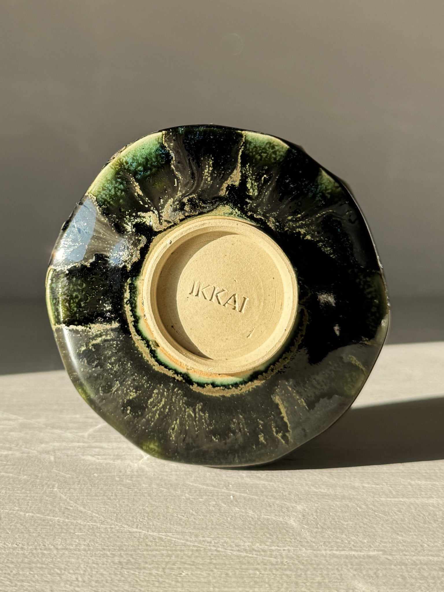 Underside view of Yunomi Cup - Hinoki #03 with green glaze pattern