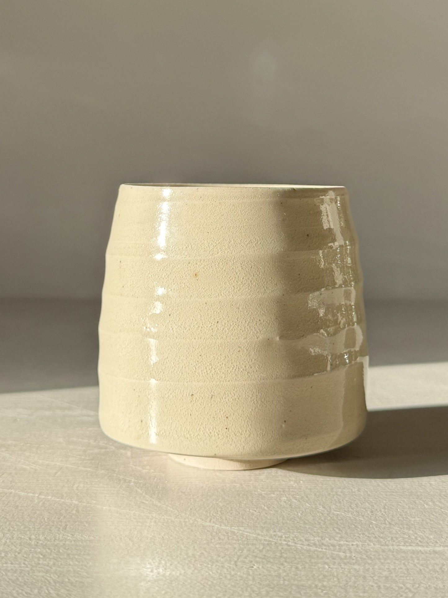 Yunomi Cups - Clear Glaze #02 with soft rounded form and subtle textured ridges, showcasing natural stoneware tones.