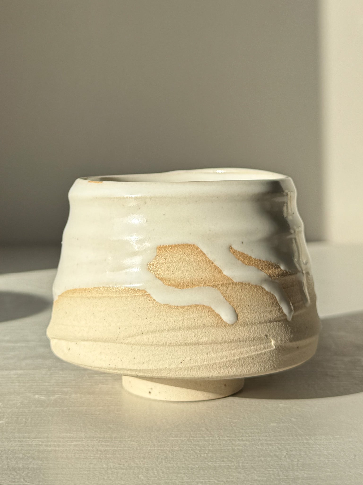 Yunomi Cup – Glossy White #02 featuring soft curves and flowing white glaze, ideal for tea or coffee.