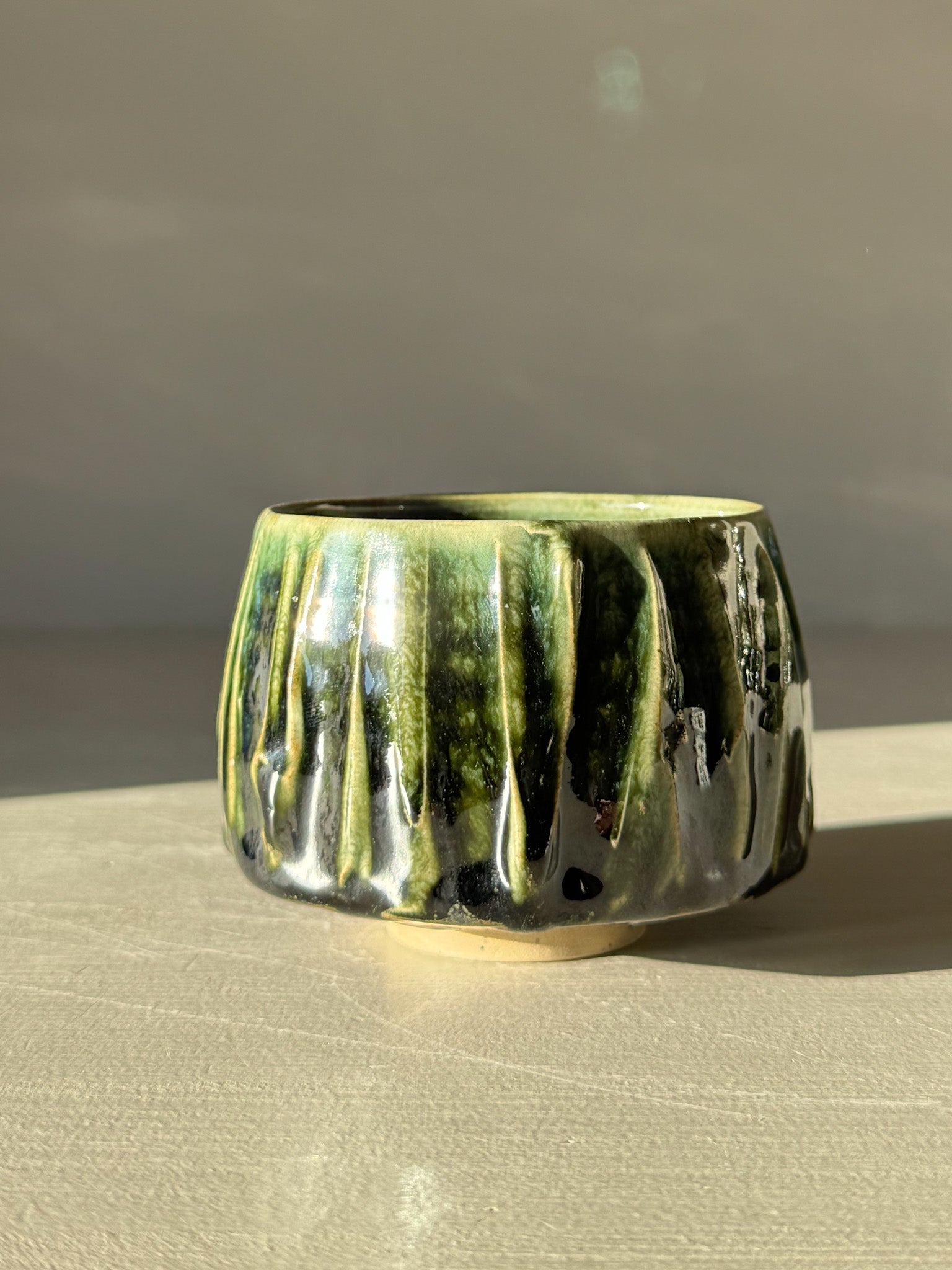 Yunomi Cup - Hinoki #11 with deep green glaze and textured surface, handmade for serene tea moments.