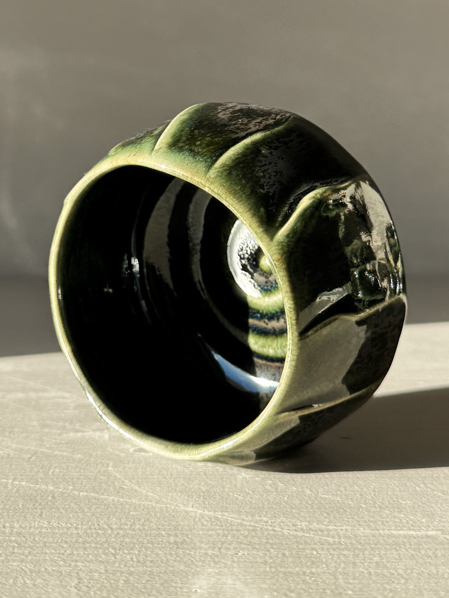 Yunomi Cup - Hinoki #03 in deep green glaze with soft flowing lines and handmade texture, ideal for everyday tea moments.