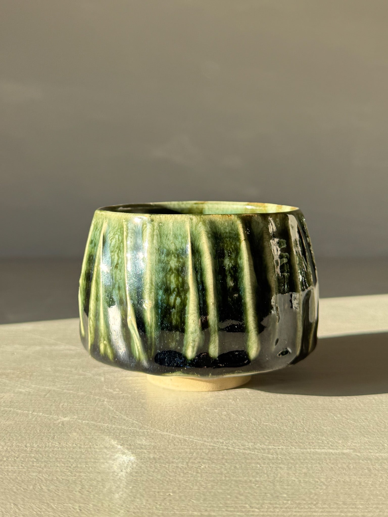 Yunomi Cup - Hinoki #11 with deep green glaze and textured slip design for unique tea moments.