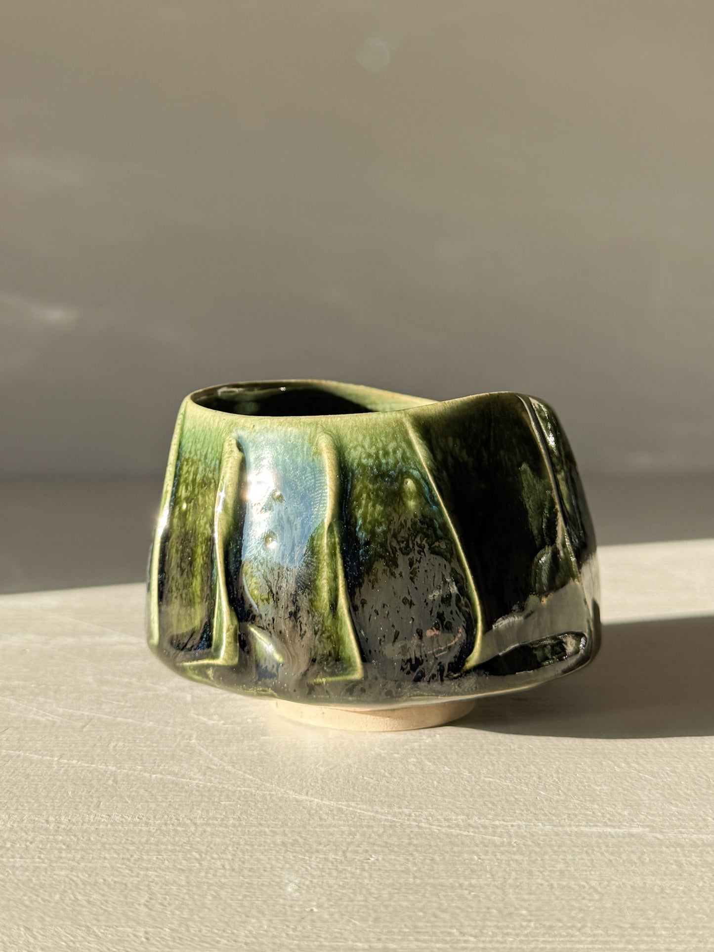 Yunomi Cup - Hinoki #08 with deep green glaze and flowing slip design handcrafted for unique tea moments.