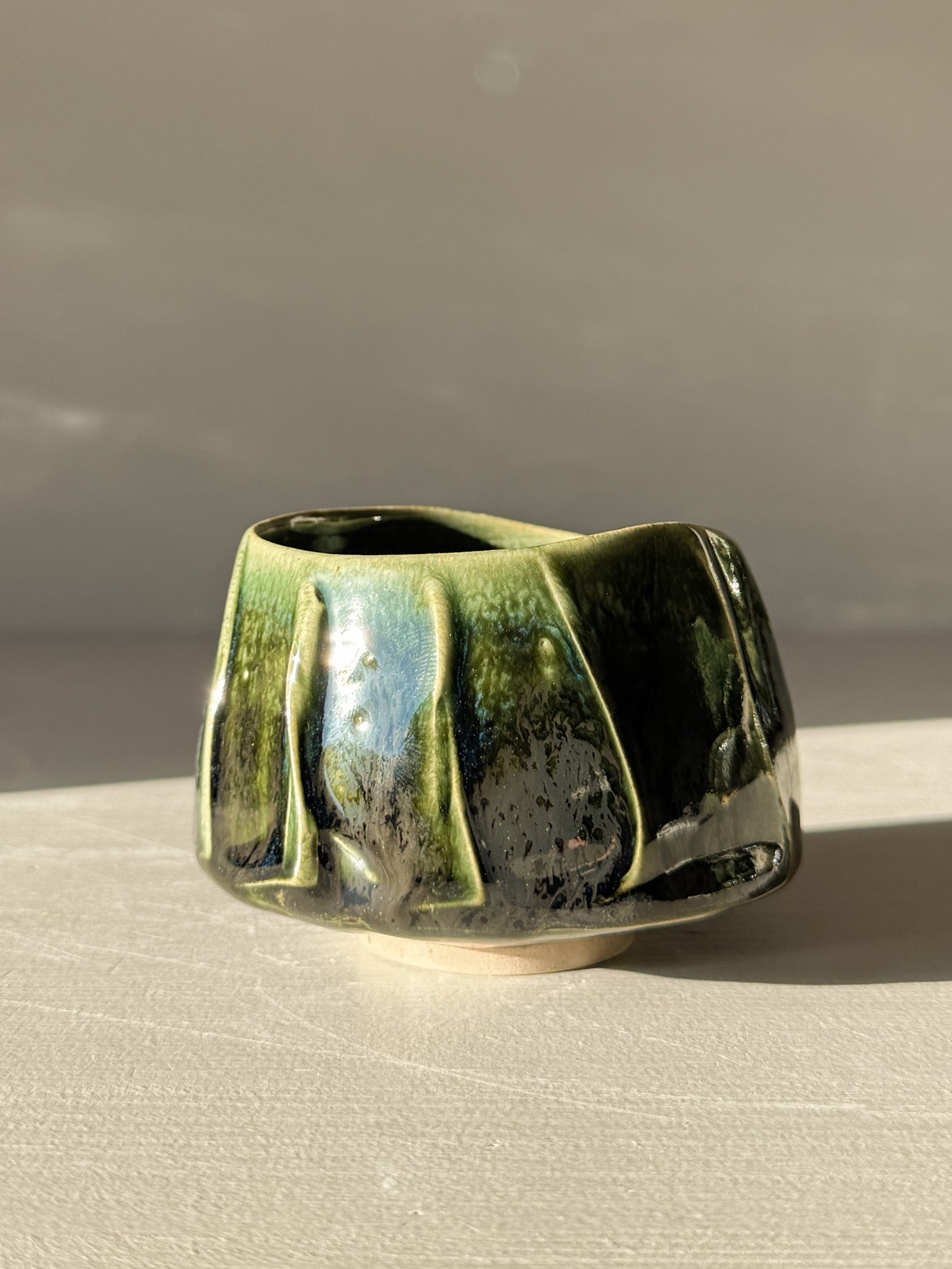 Yunomi Cup - Hinoki #08 with deep green glaze and flowing slip design handcrafted for unique tea moments.