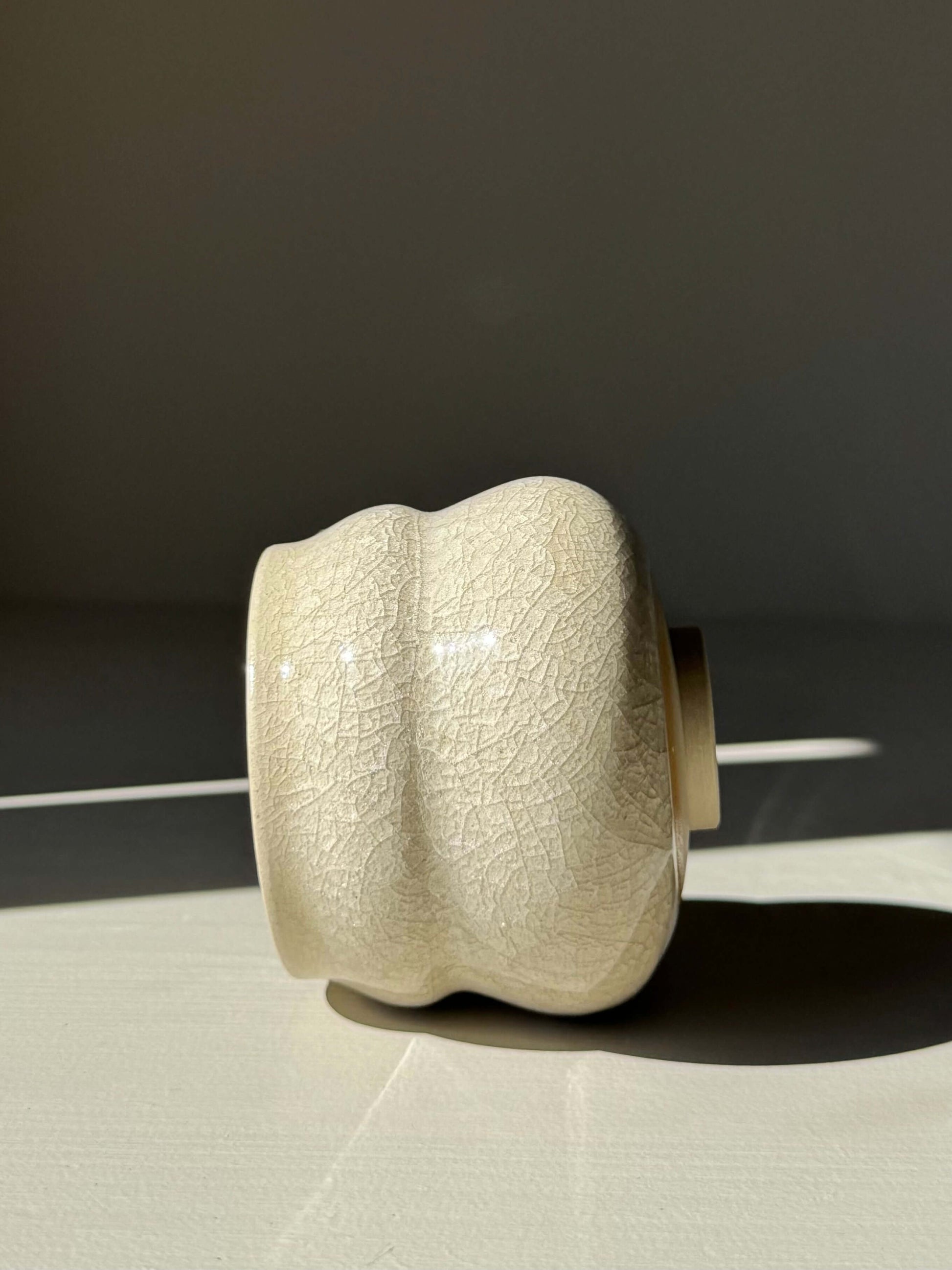 Handmade ceramic Yunomi Cup - Kannyū Series #01 with crackle glaze and flowing rim design.