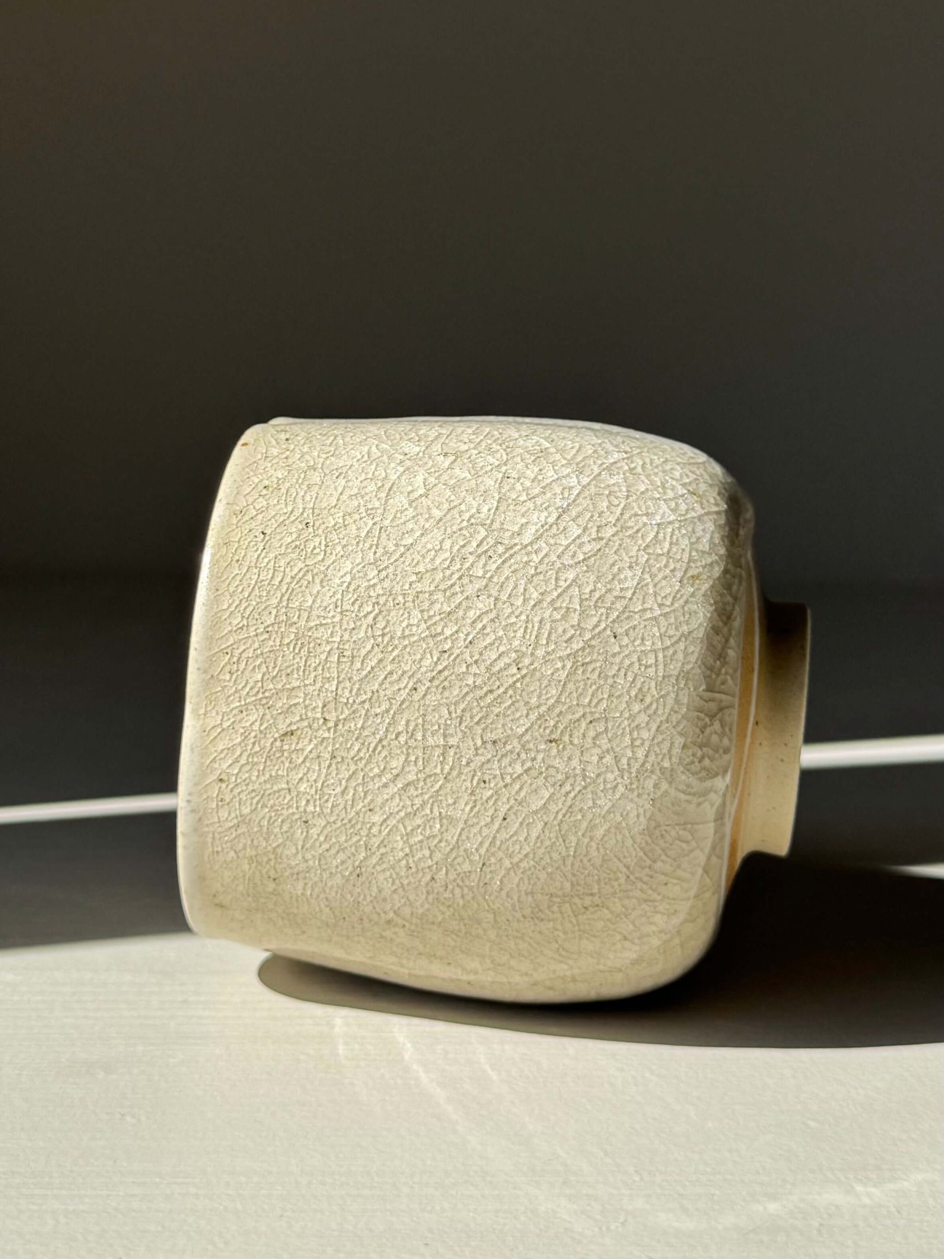 Handmade ceramic Yunomi Cup - Kannyū Series #08 with crackle glaze pattern, showcasing a delicate design and elegant craftsmanship.