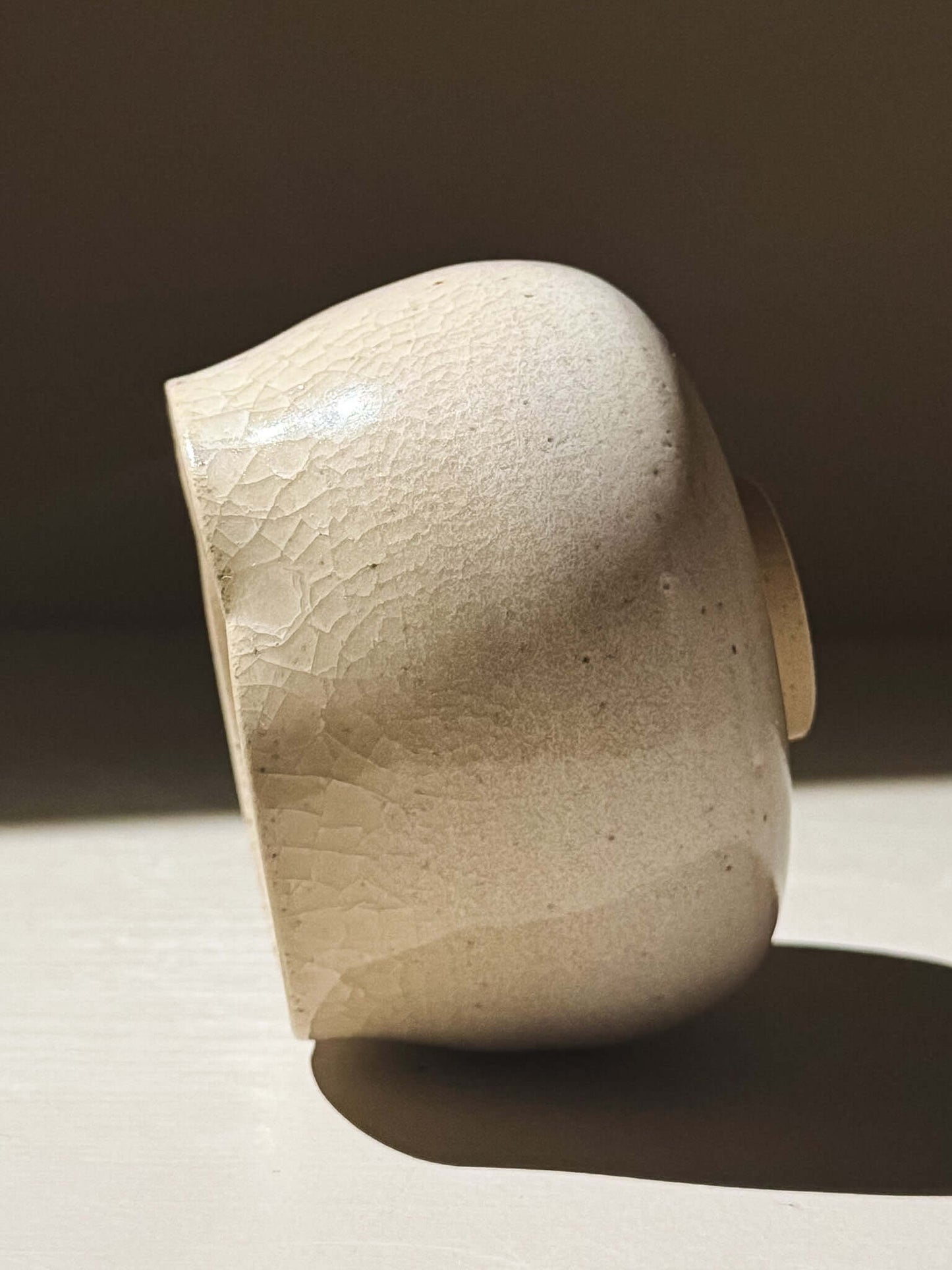 Yunomi Cup - Kannyū Series  #10 side view showcasing its crackle glaze and elegant design.